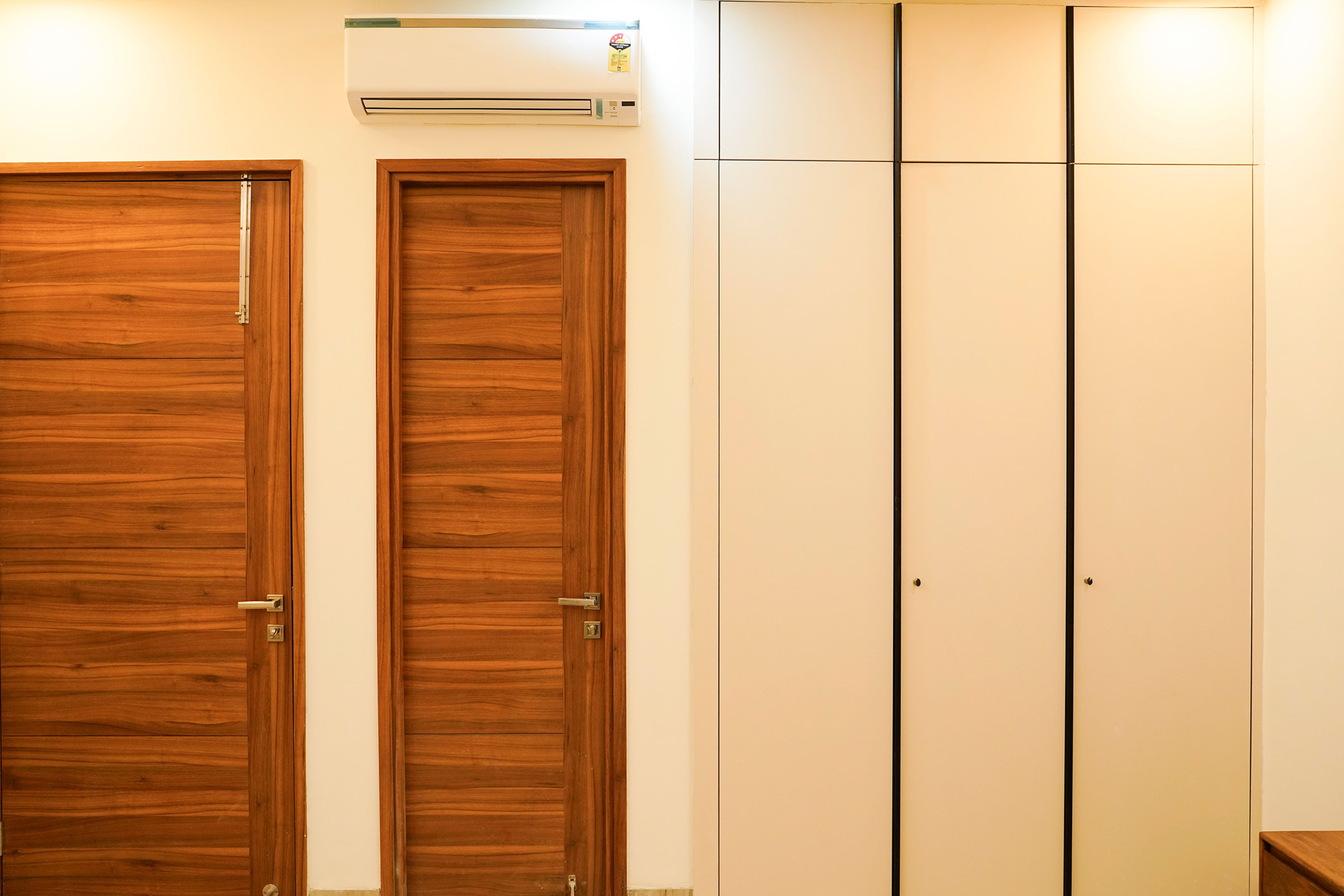 Bedroom Design with Cream 3-Door Swing Wardrobe