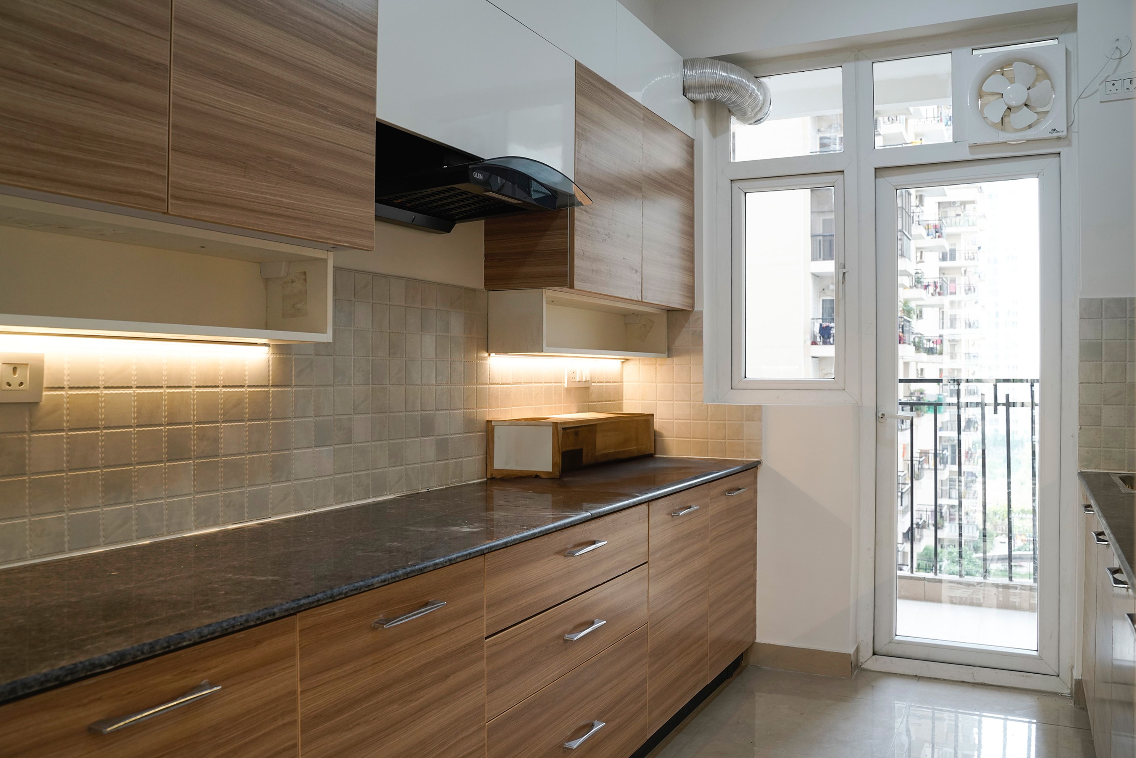 Parallel Kitchen Design with Wooden and White units and Granite Countertop