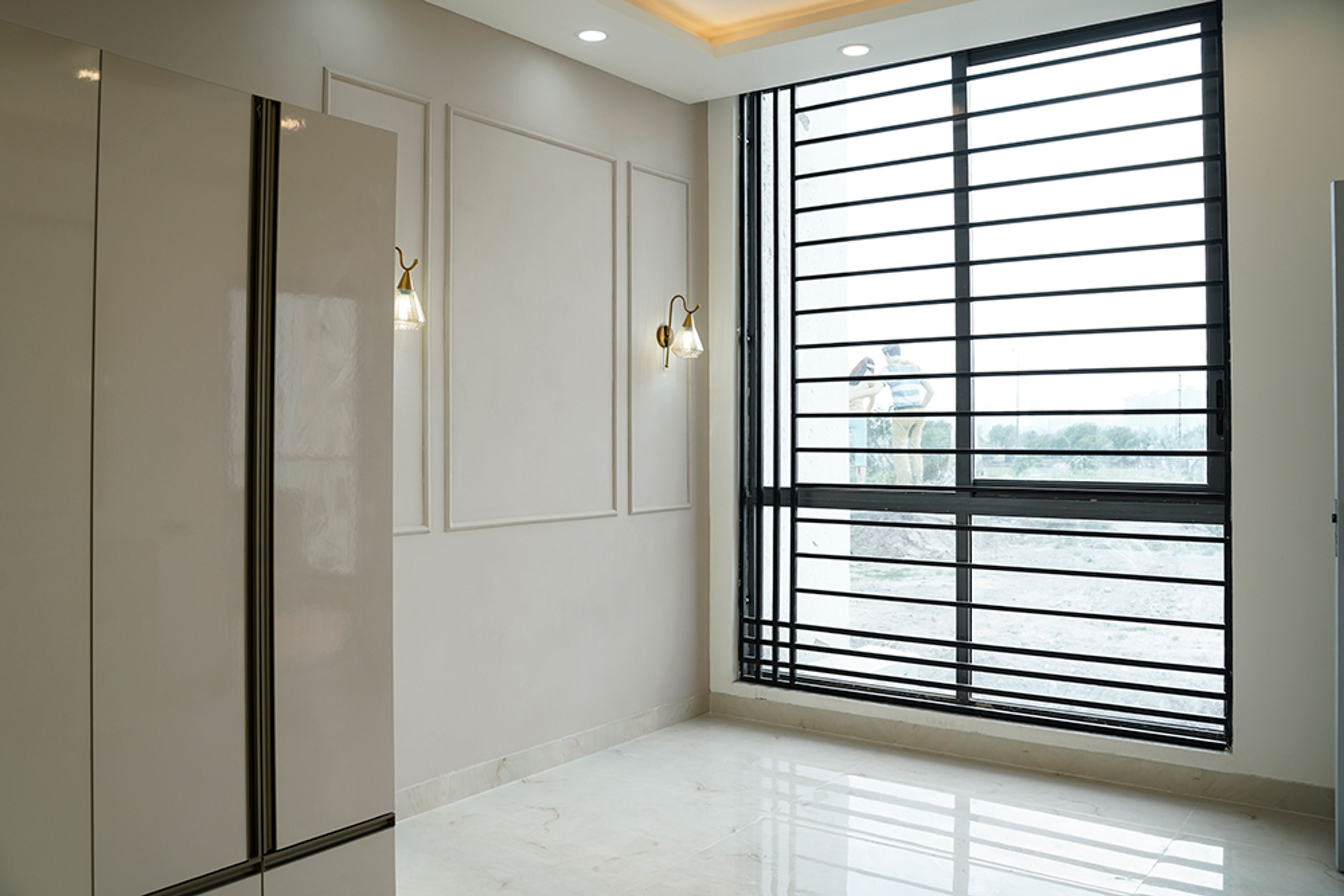 Bedroom Design with Beige Wall and 4-Door Swing Wardrobe