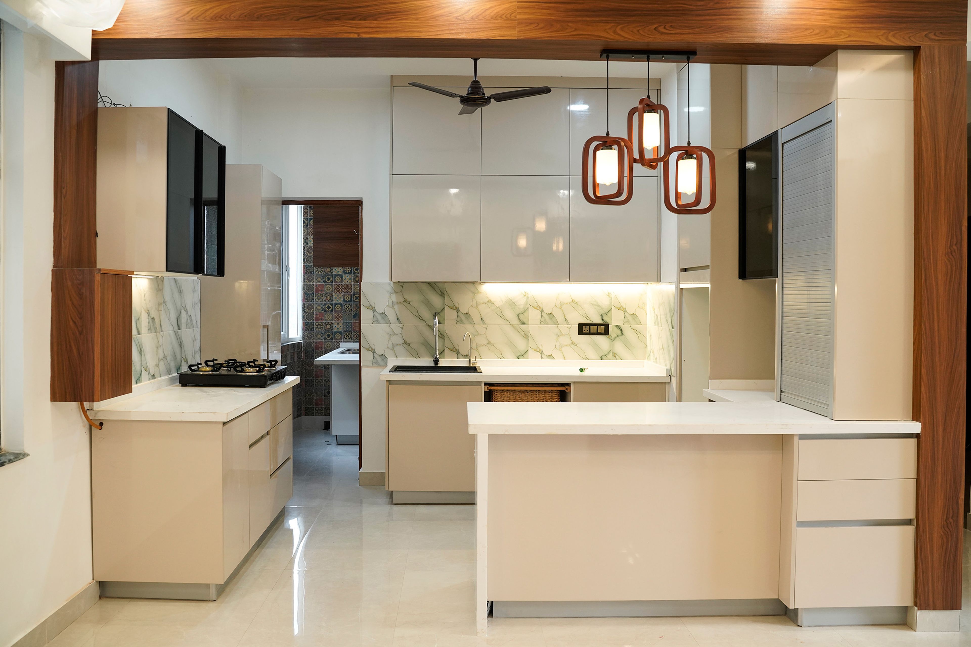 Open Kitchen with Quartz Countertop and Cream Units