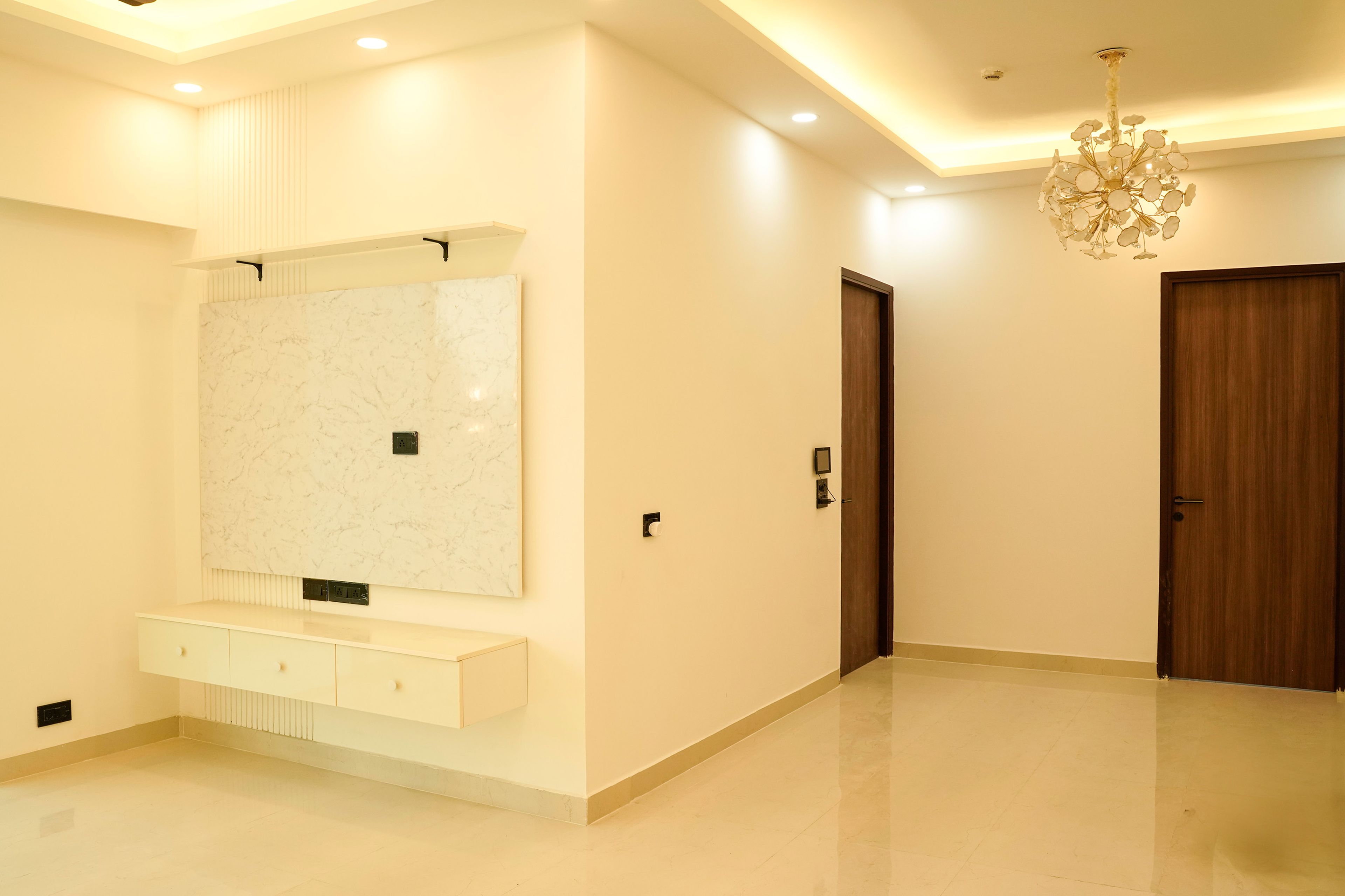 Living room design with off white TV Unit