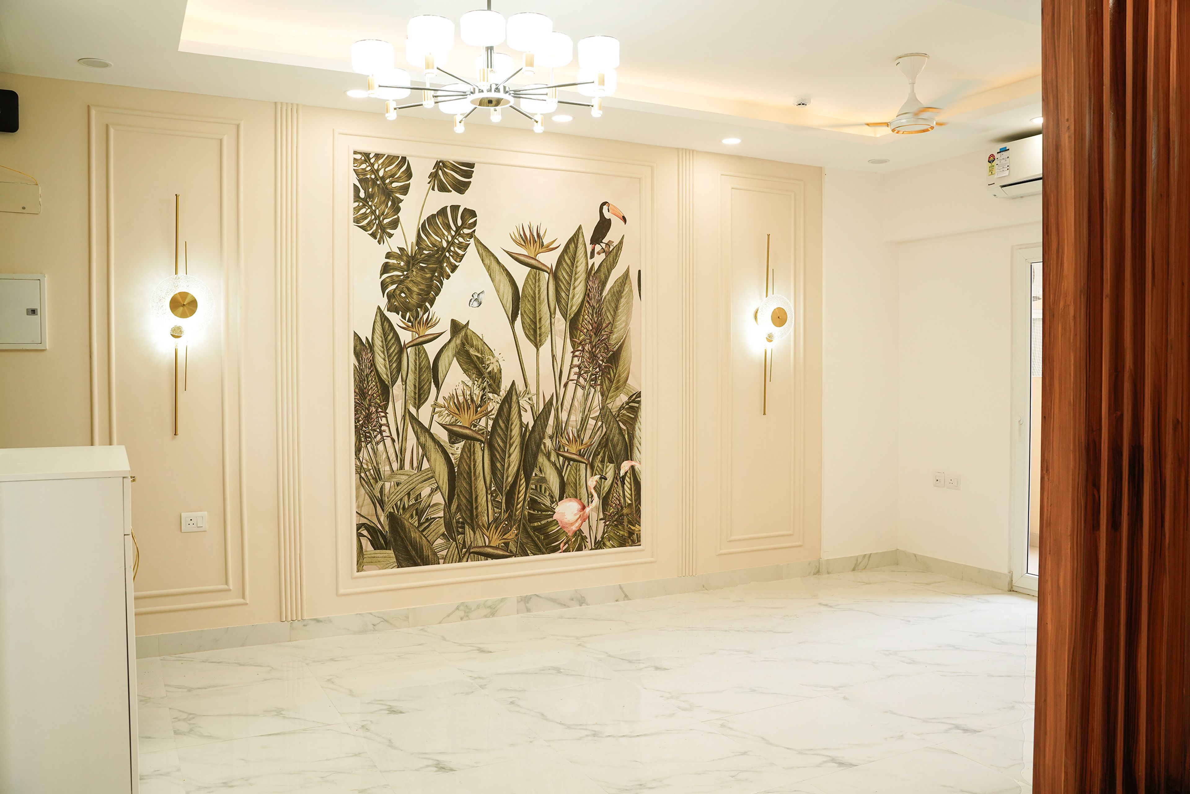 Living Room Design with Cream Wall with Trims and Tropical Themed Wall