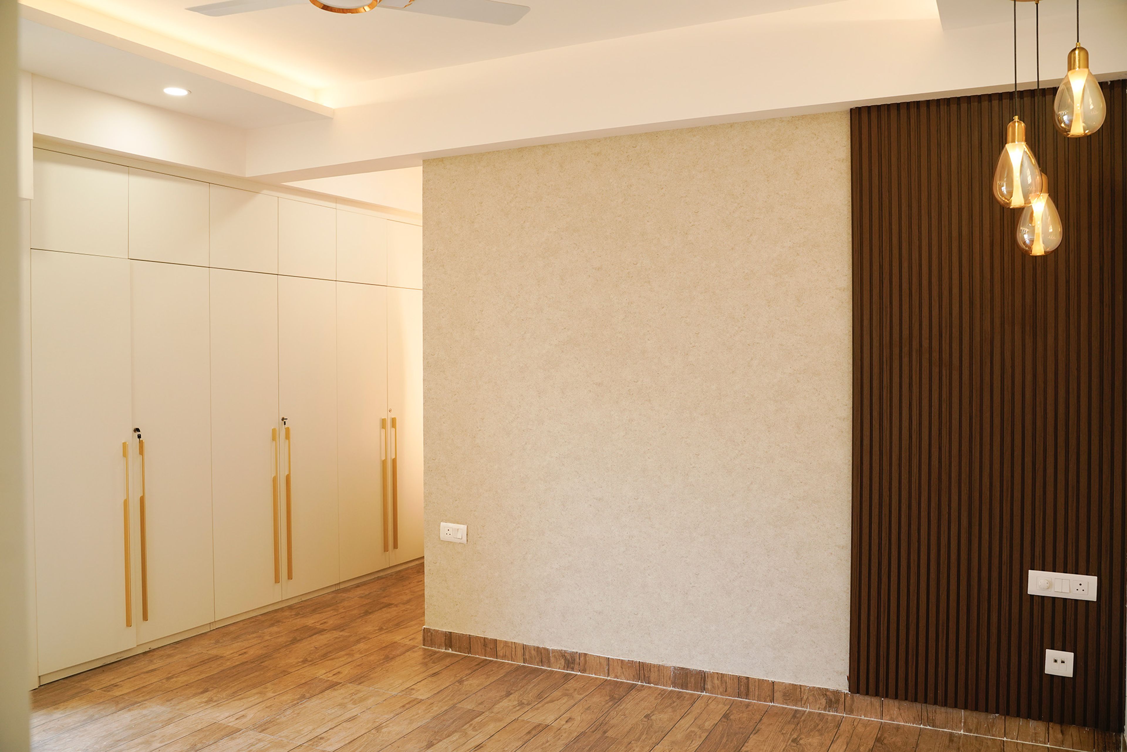 Bedroom Design with Wooden Slats Wall and 6-Door Swing Wardrobe