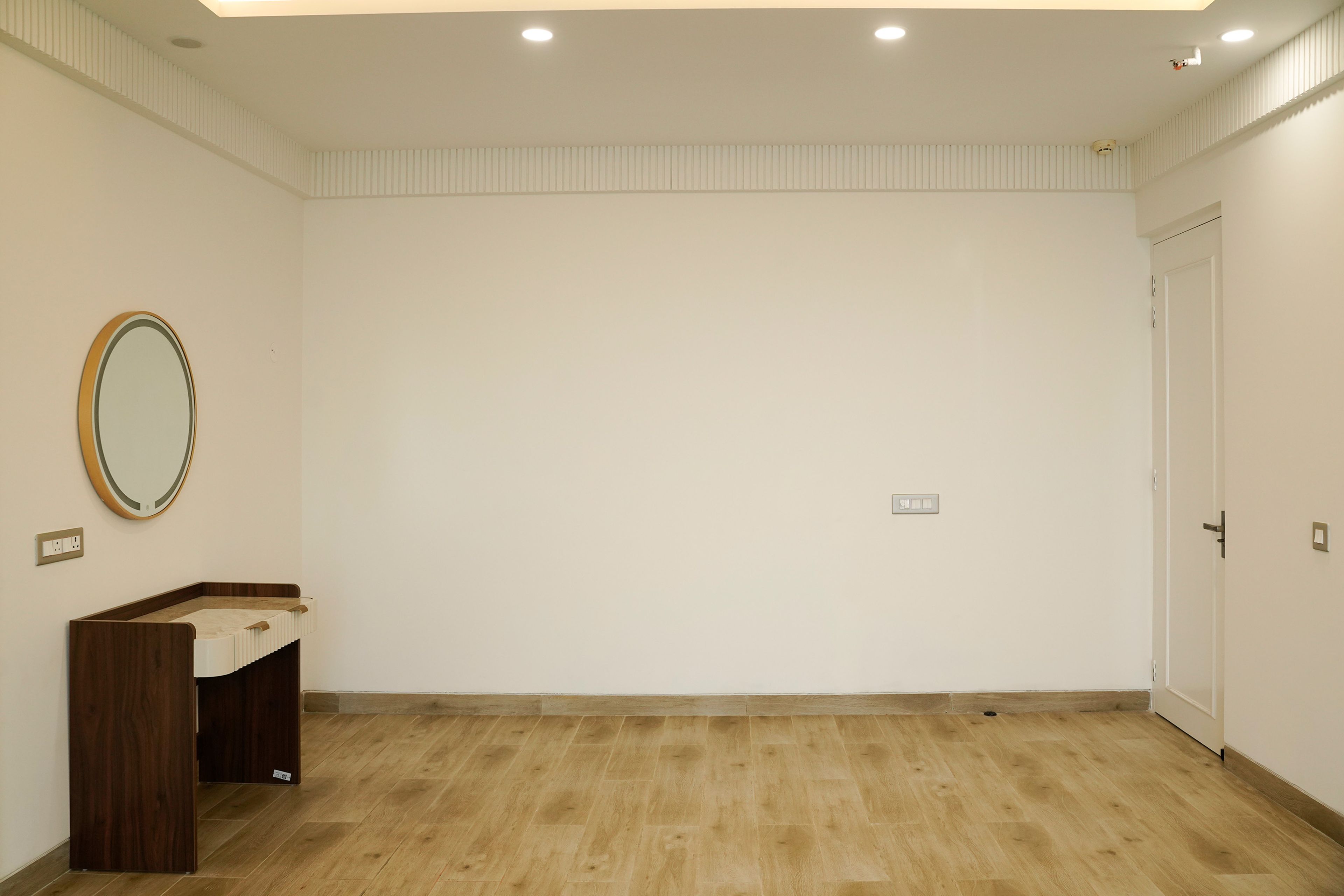 White Wall Design with Wooden Flooring