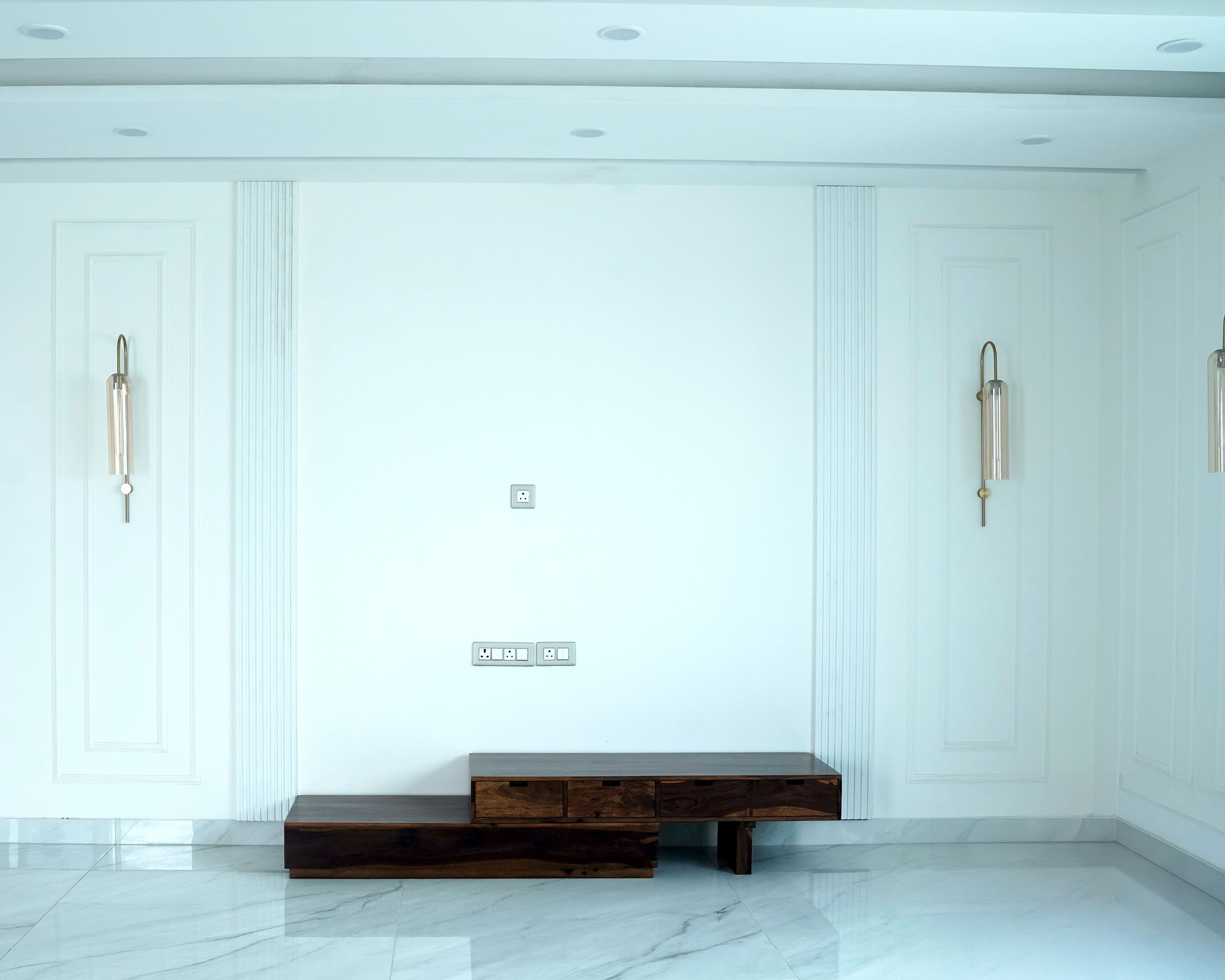 Wooden TV Unit with White Wall Backsplash with Fluted Panels