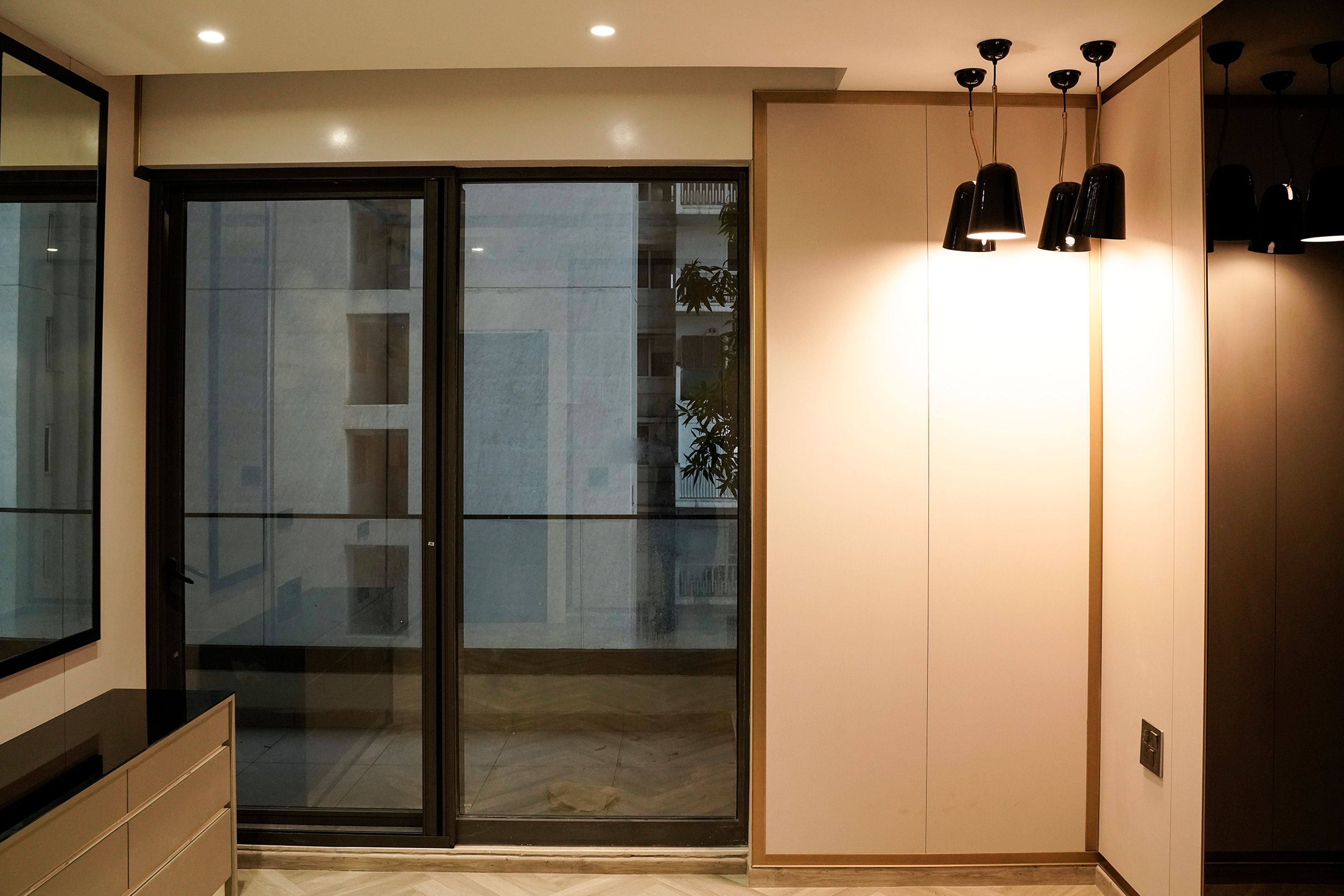 Off-White Wall Design with Beige Dresser