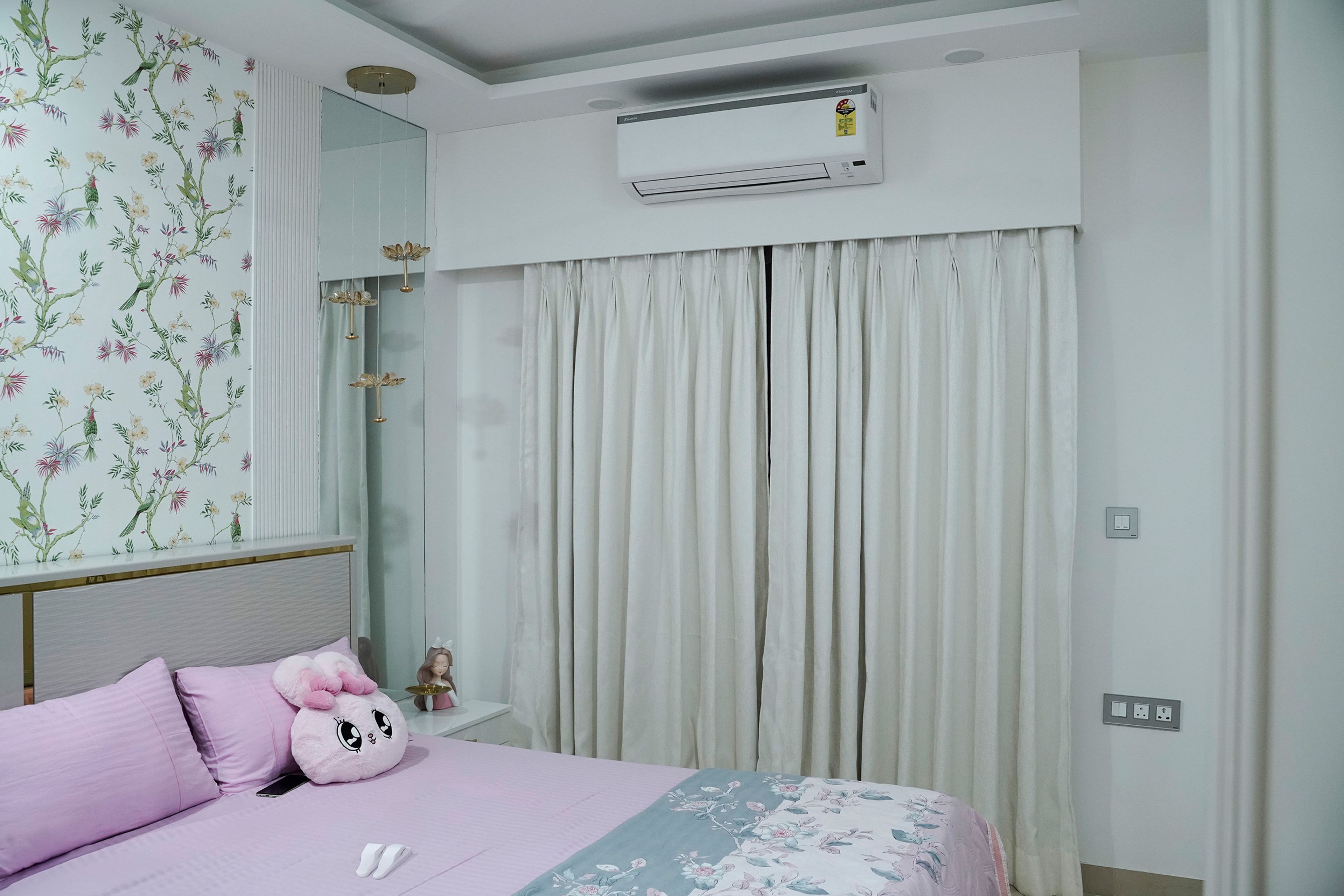 Kids Bedroom Design with Wall Mounted Mirror Vanity and Pink Upholstery Bed