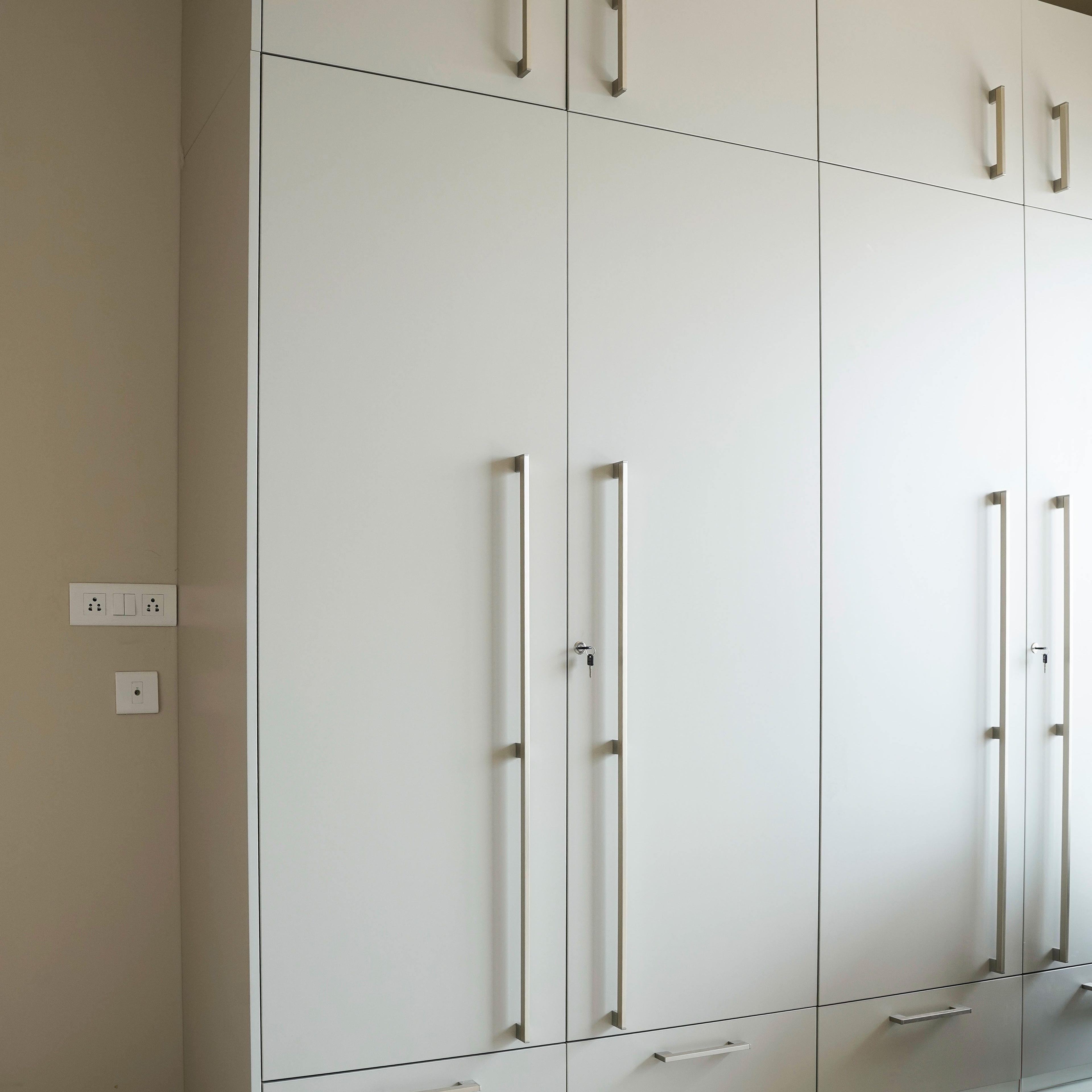 4-Door White Swing Door Wardrobe Design