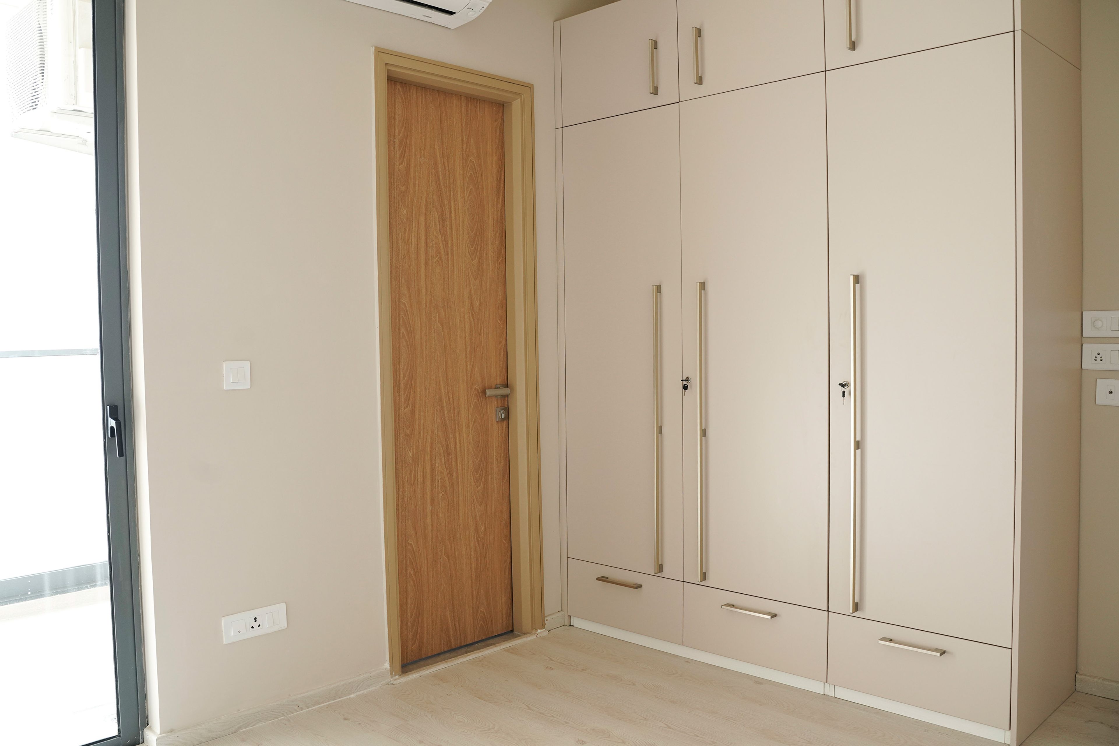 4-Door Beige Swing Door Wardrobe Design
