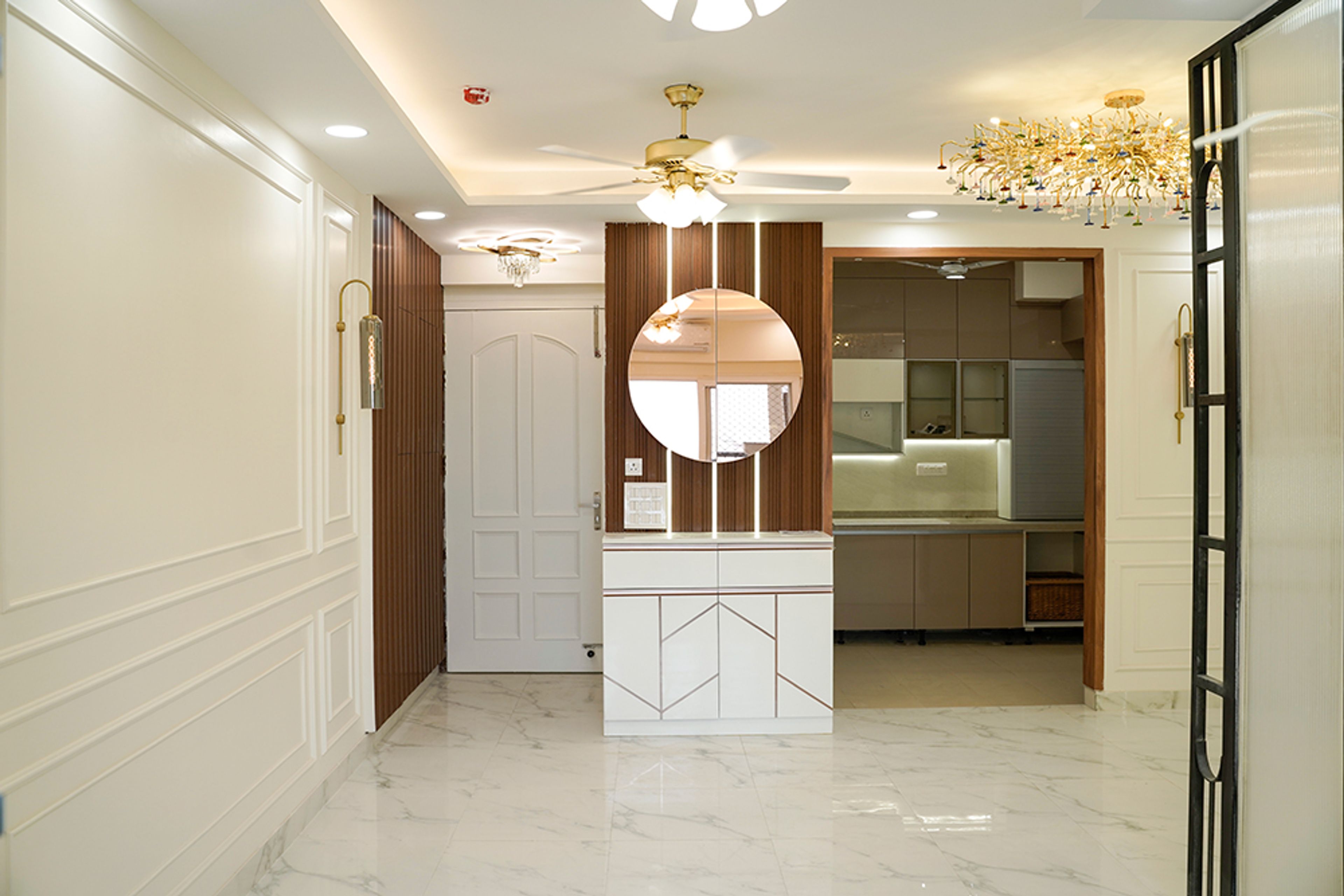 Living Room Design with Round Mirror with White Geometric Drawers