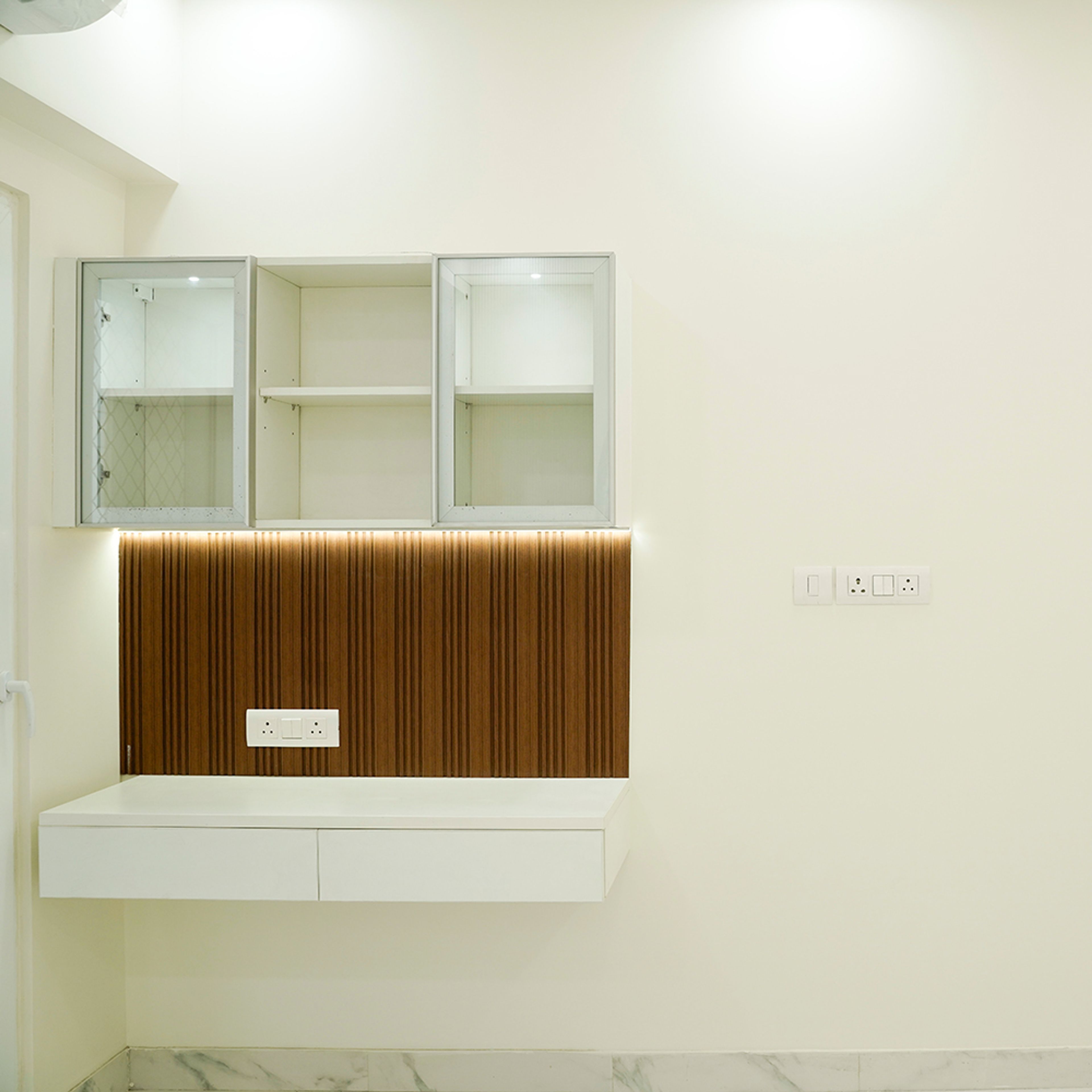 Study Unit Design with Glass Wall Unit and Wooden Grooves