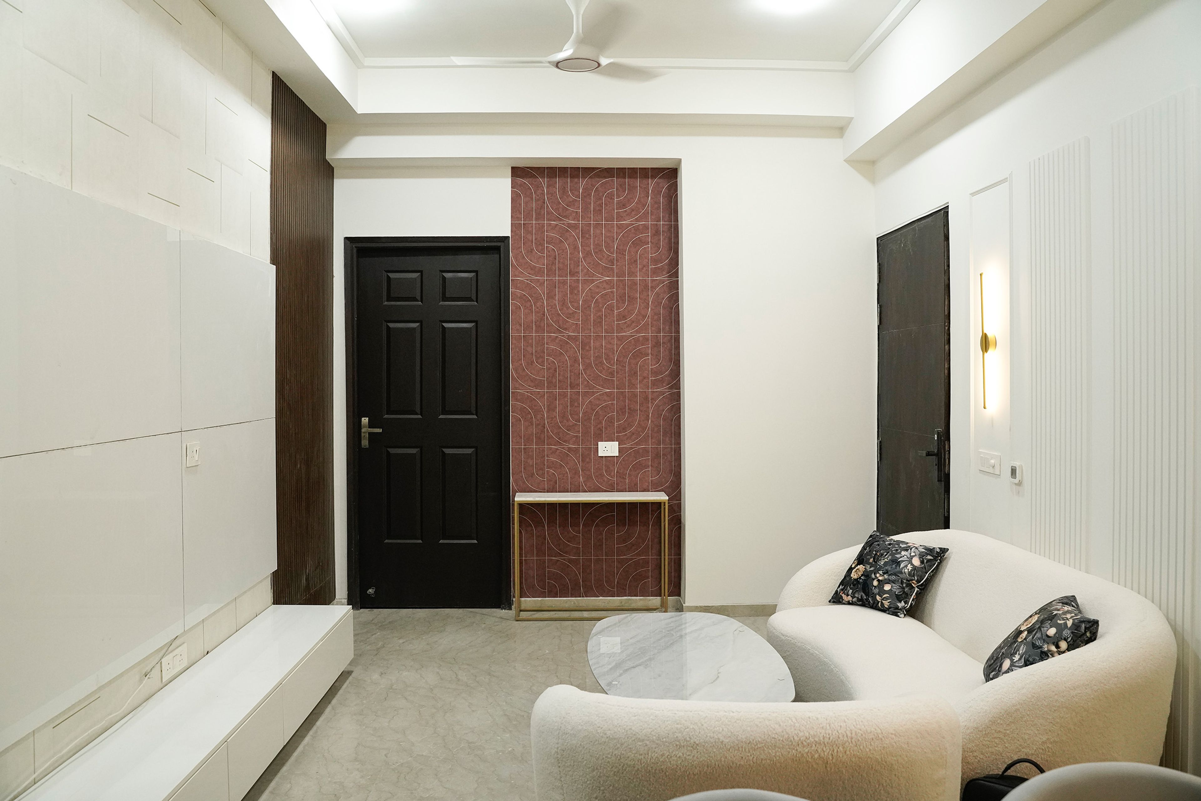 Living Room Design with Off-White Sofas and White TV Unit