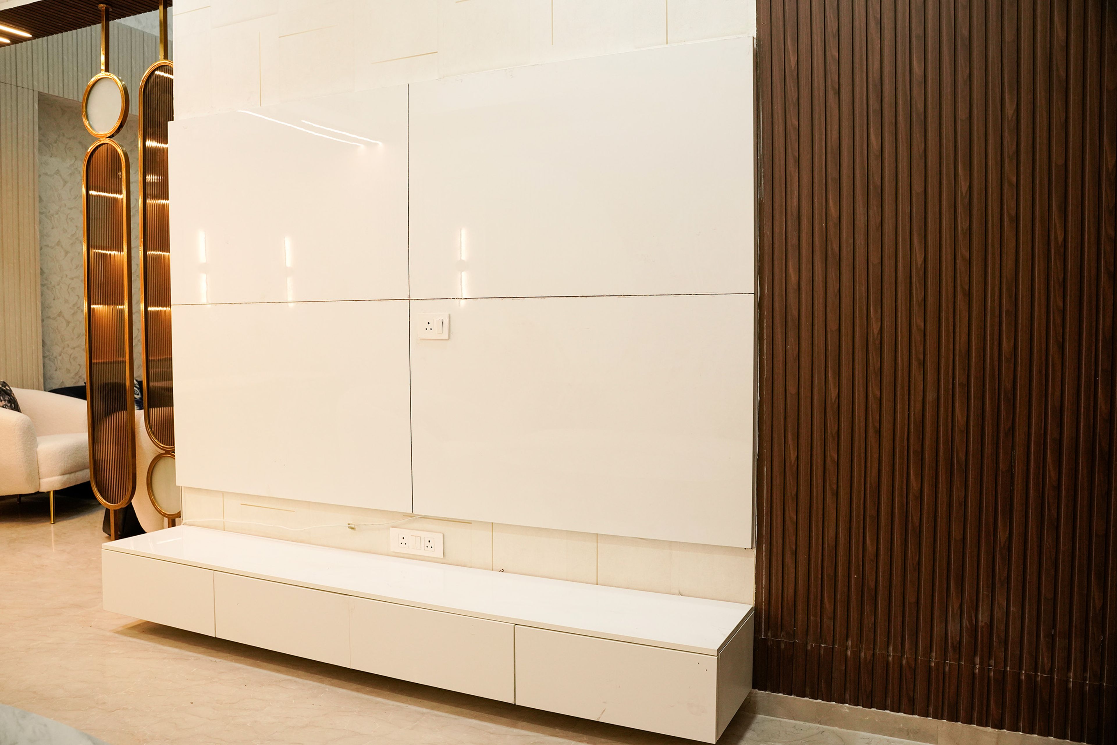 White TV Unit Design with Drawers and Wooden Slatted Walls