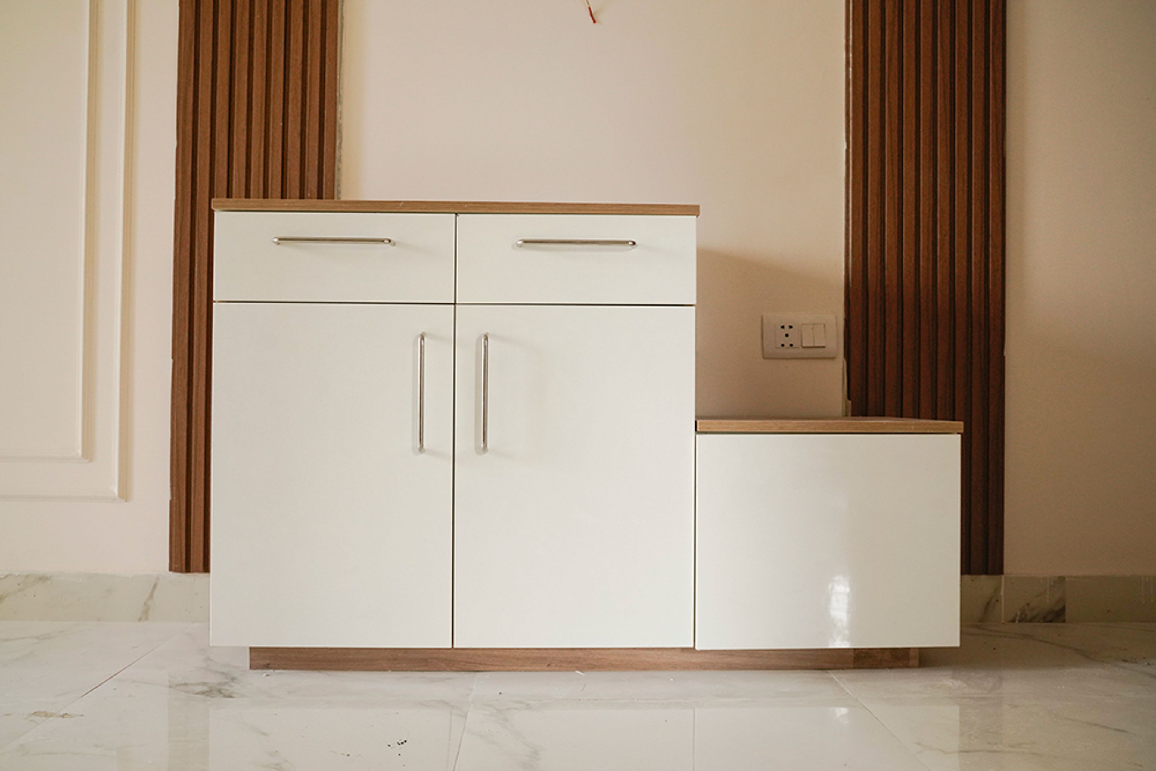 White Storage Unit with Seating Space