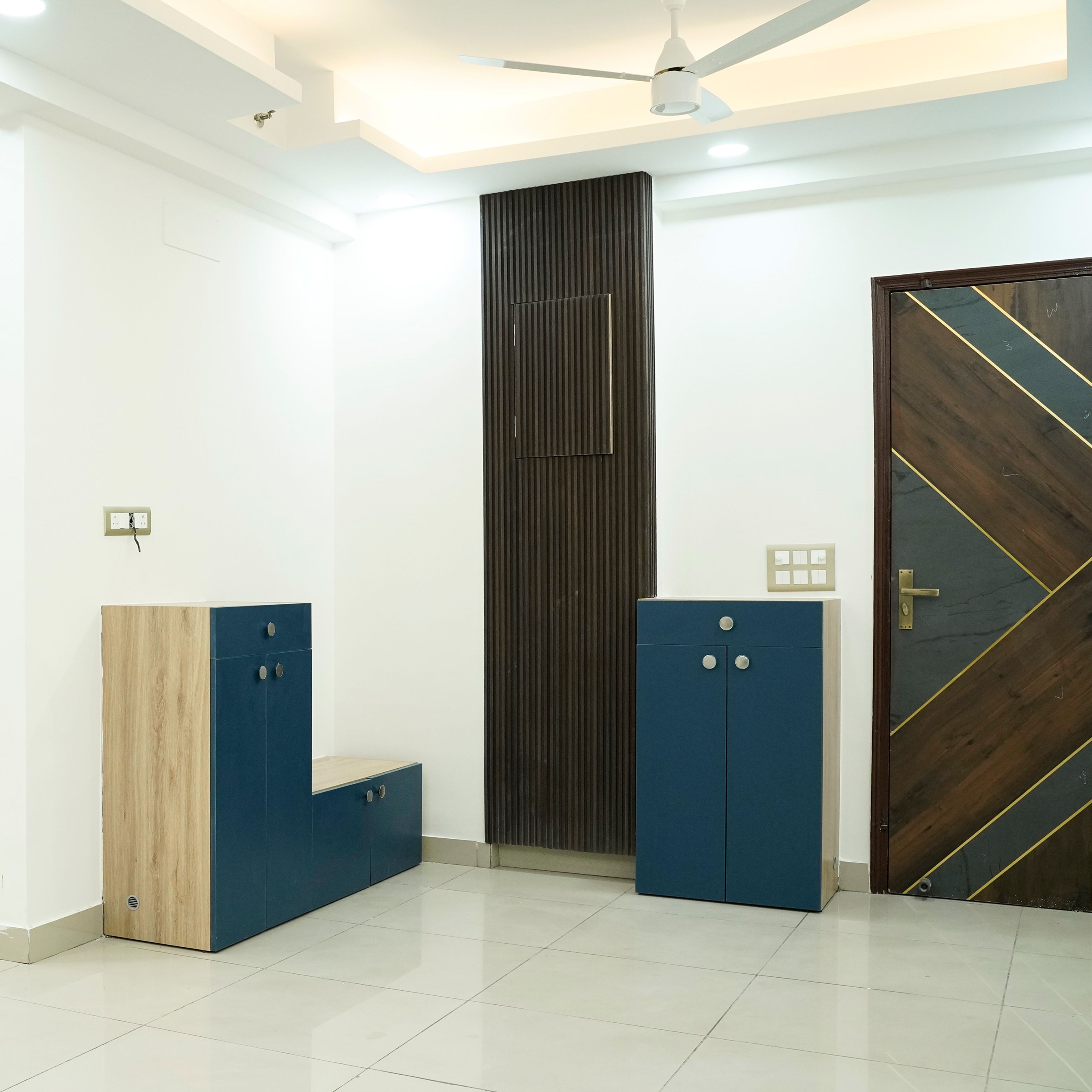 Foyer Design with Two Blue Storage Units