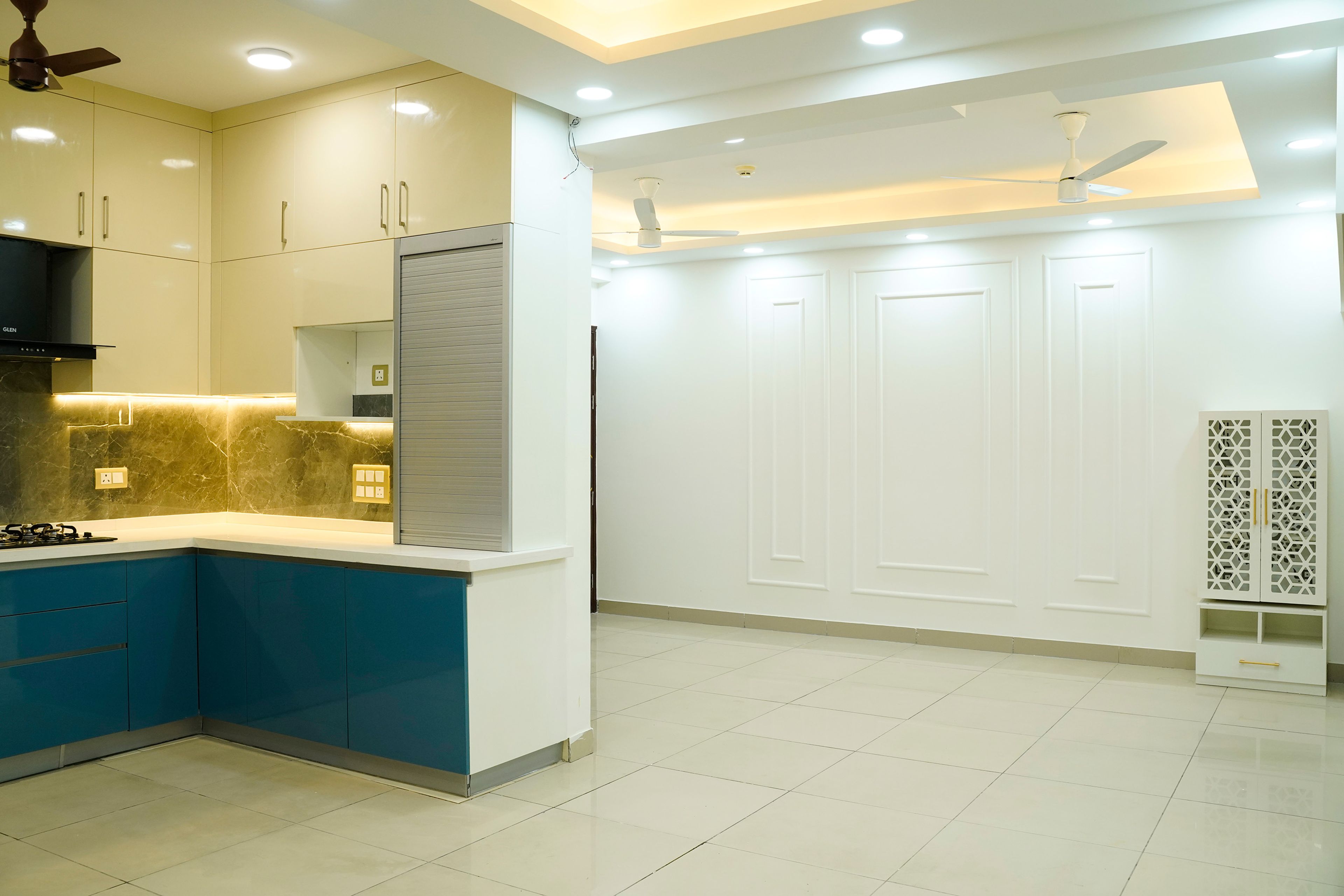 Dining Room Design with White Wall with Trims, Pooja Unit and Peripheral False Ceiling