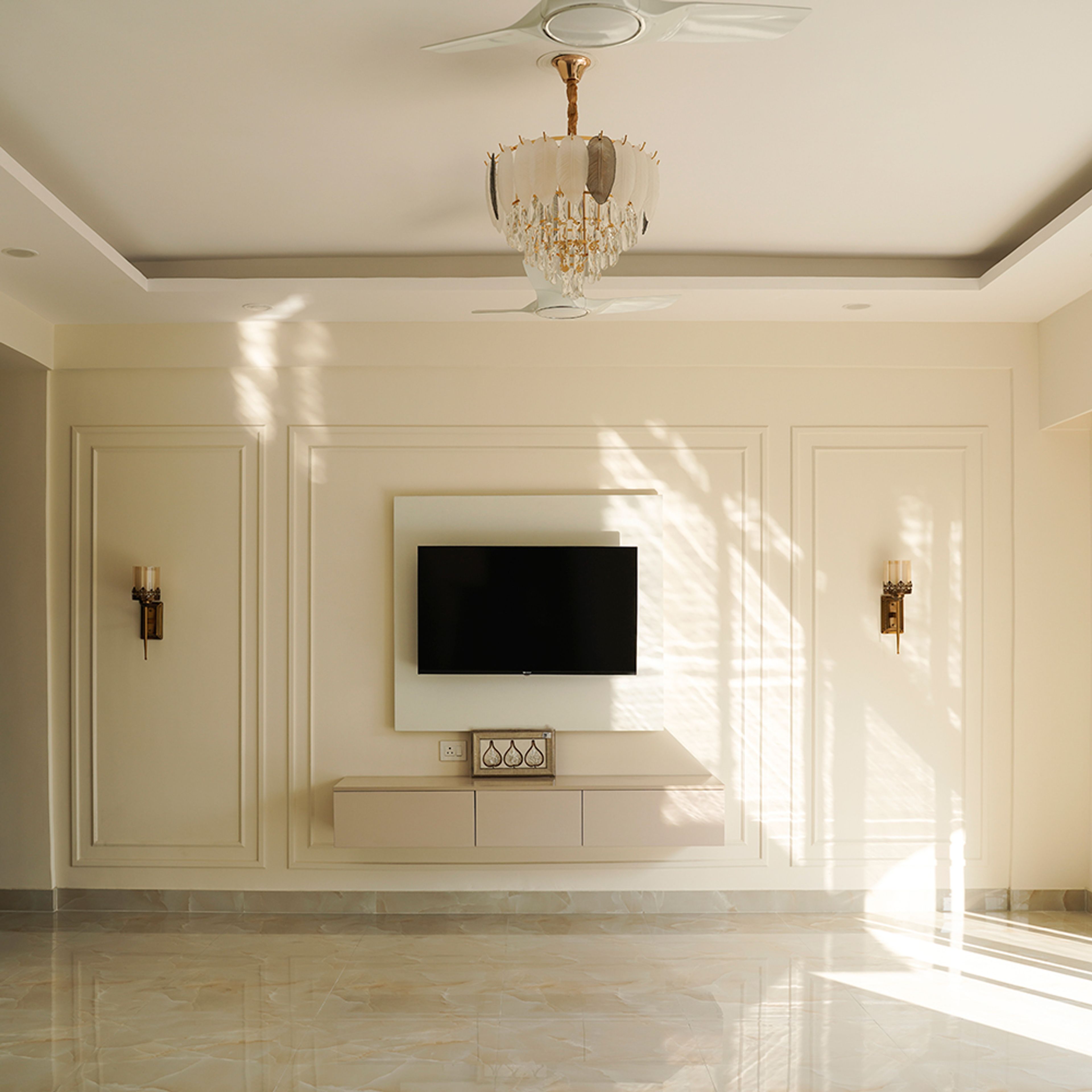 TV Unit Design with Cream Wall with Trims, Off-White Backsplash and Beige Floating Drawers