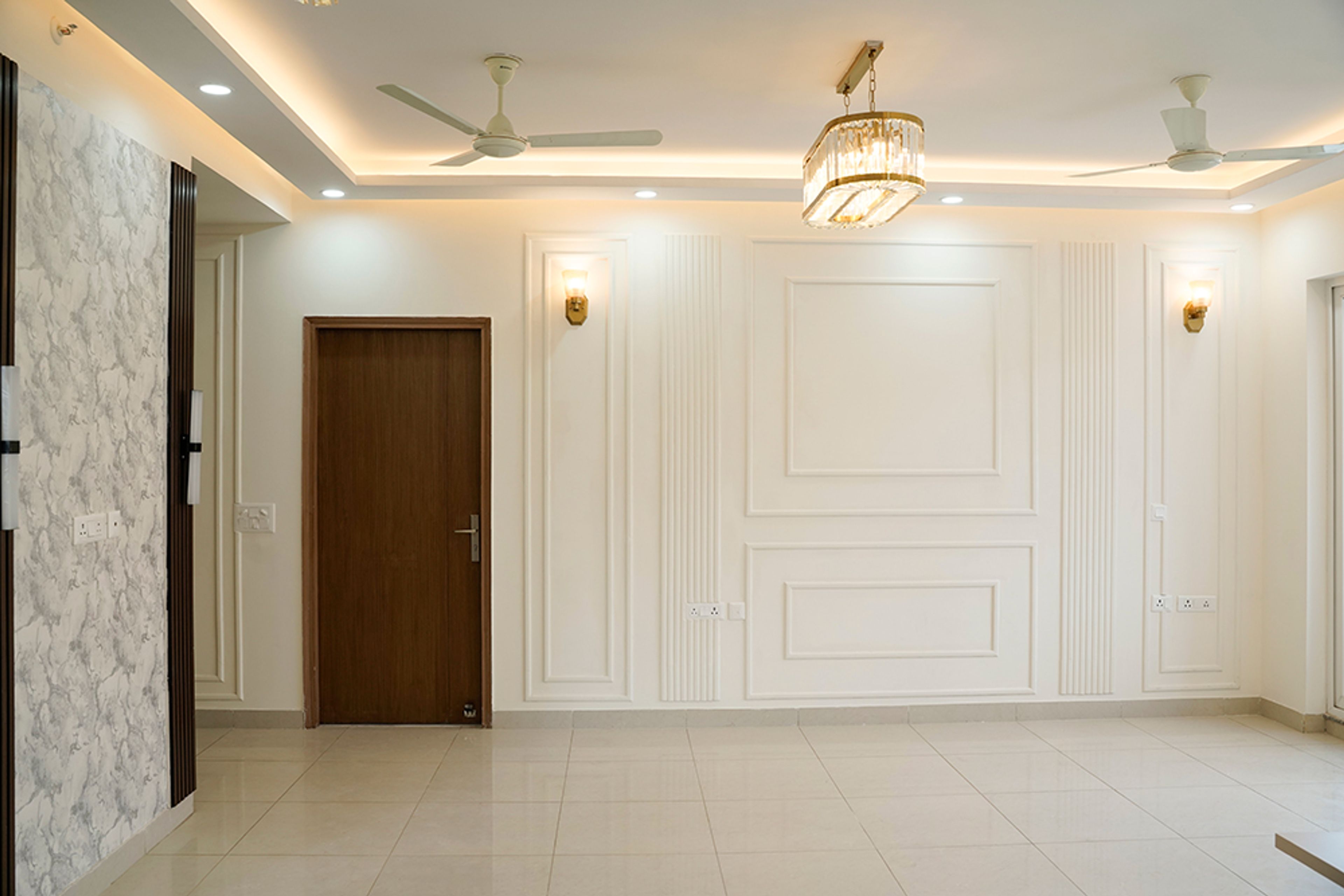 Living Room Design with Off-White Wall with Rectangular Trims and False Ceiling