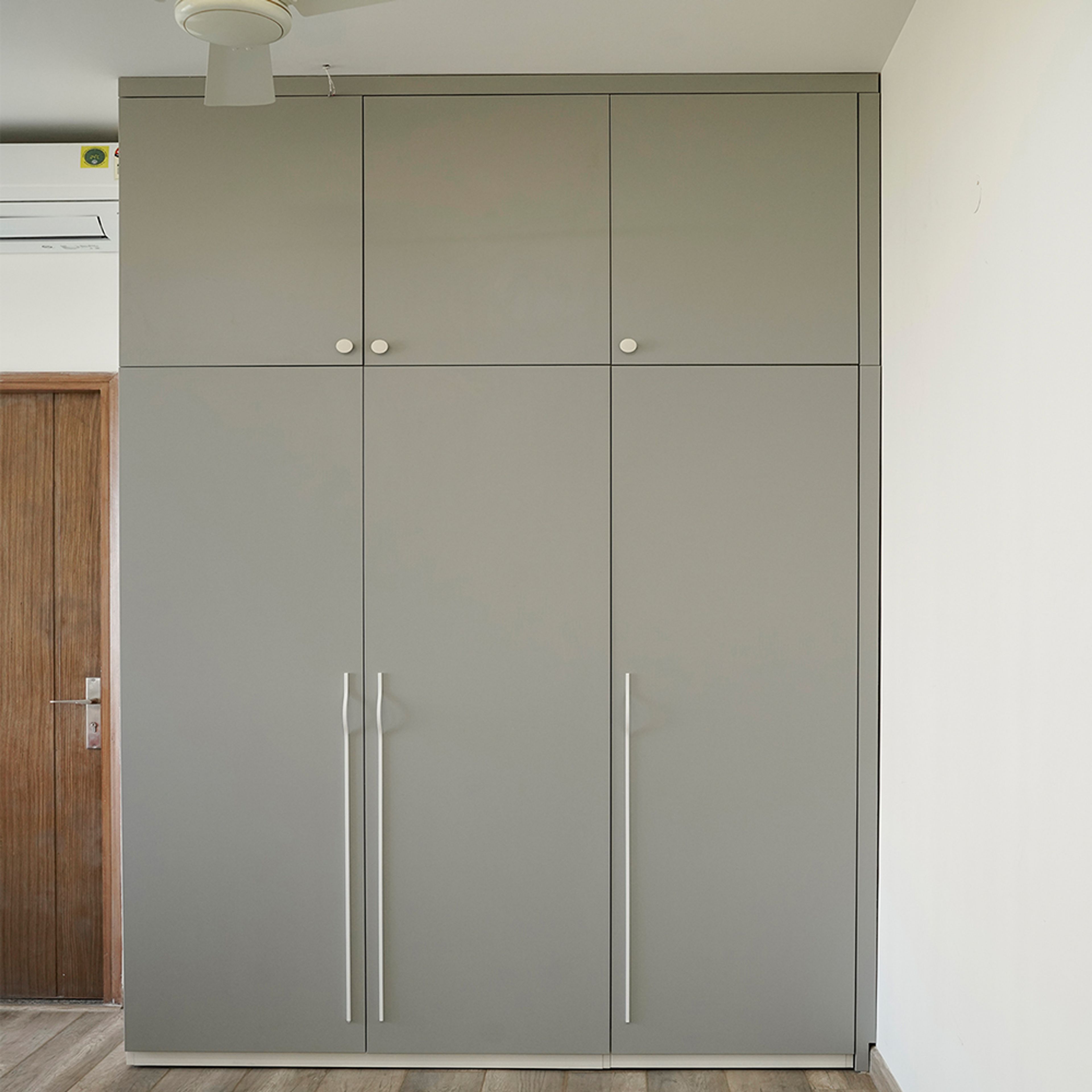 3-Door Grey Swing Wardrobe Design