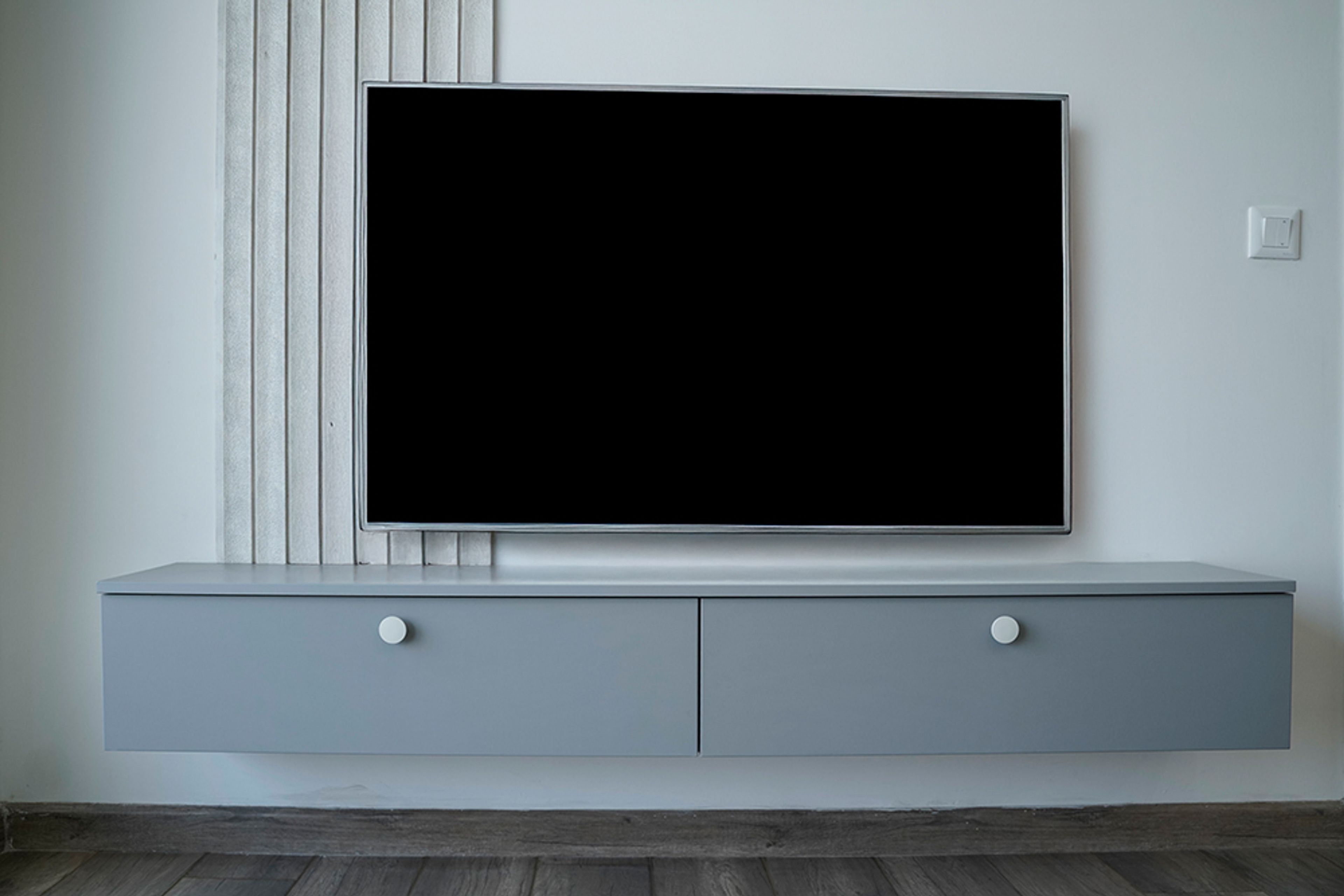 TV Unit Design with Grey Wall Grooves and Wall Mounted Drawers