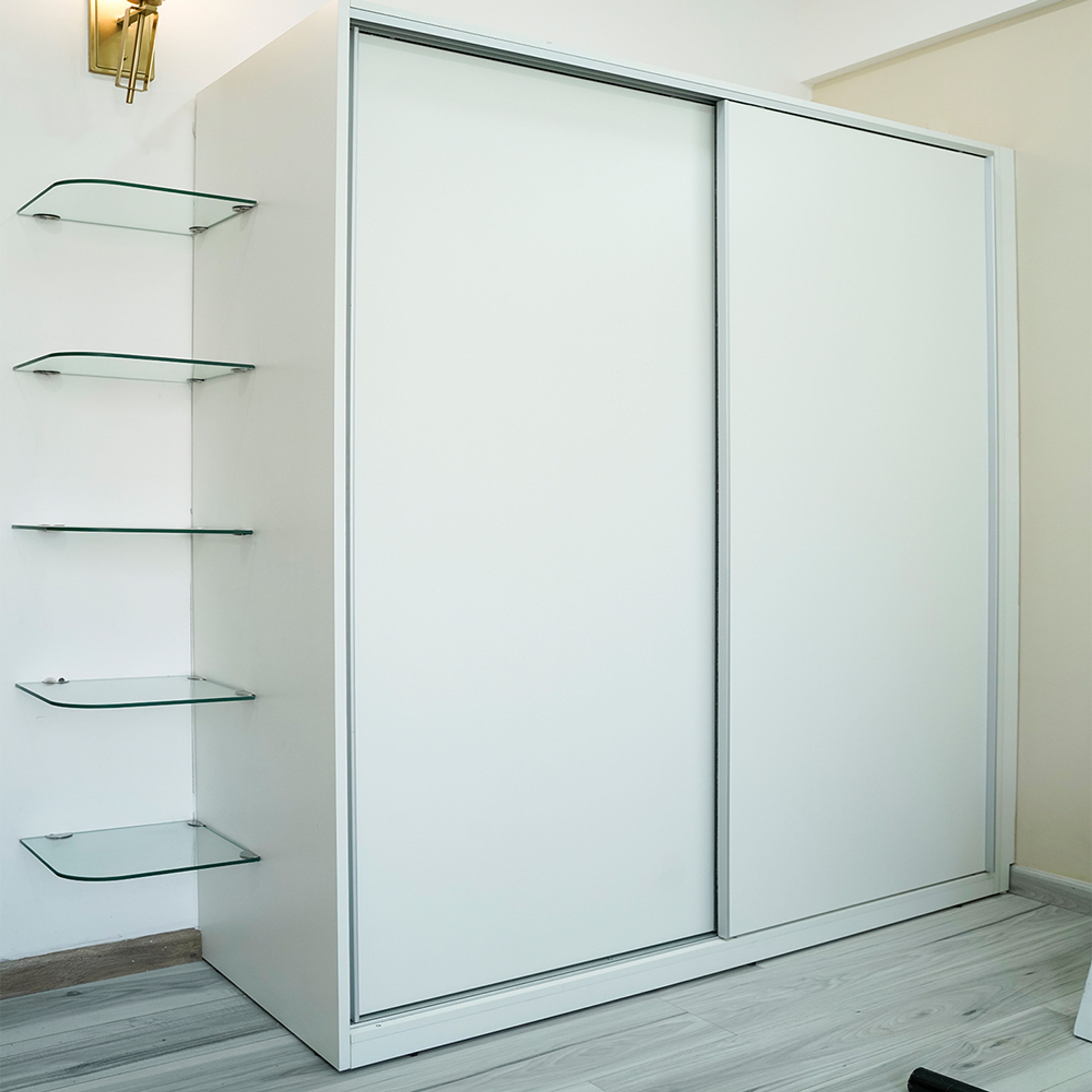 Contemporary Sliding Wardrobe Design with Loft Unit in Noida 3BHK Apartment
