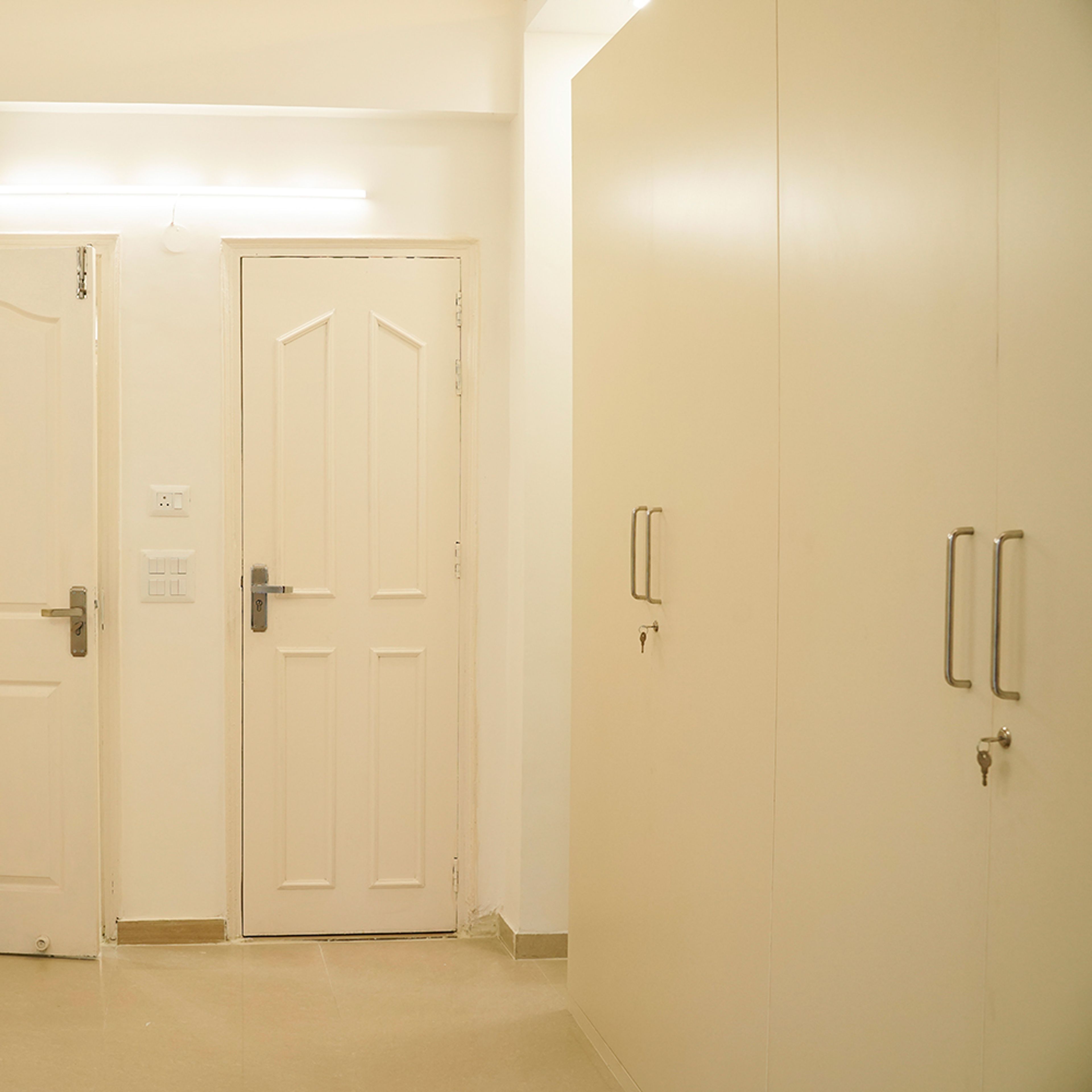 Bedroom Design with 4-Door Cream Swing Wardrobe