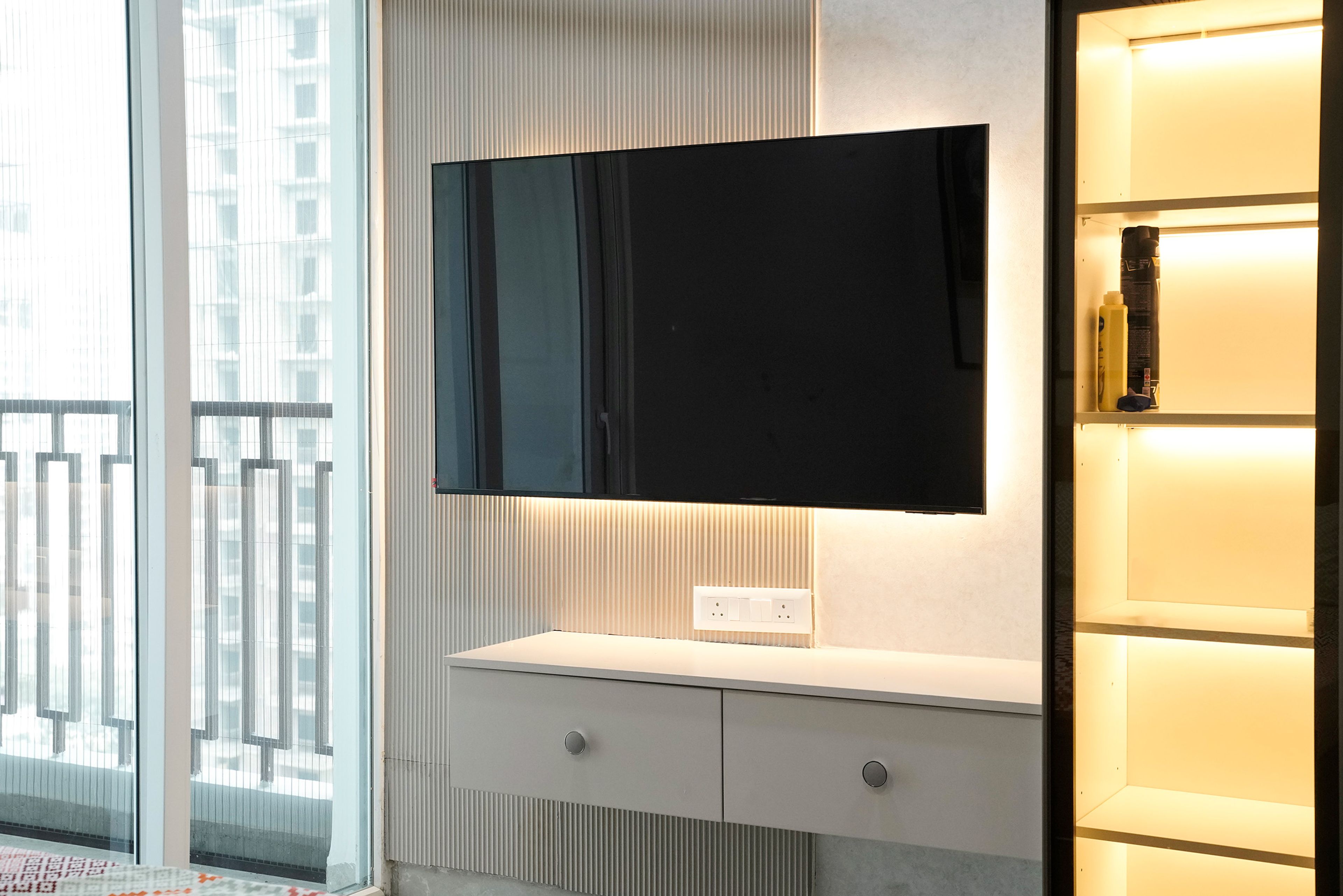 TV unit design with grey wall slats