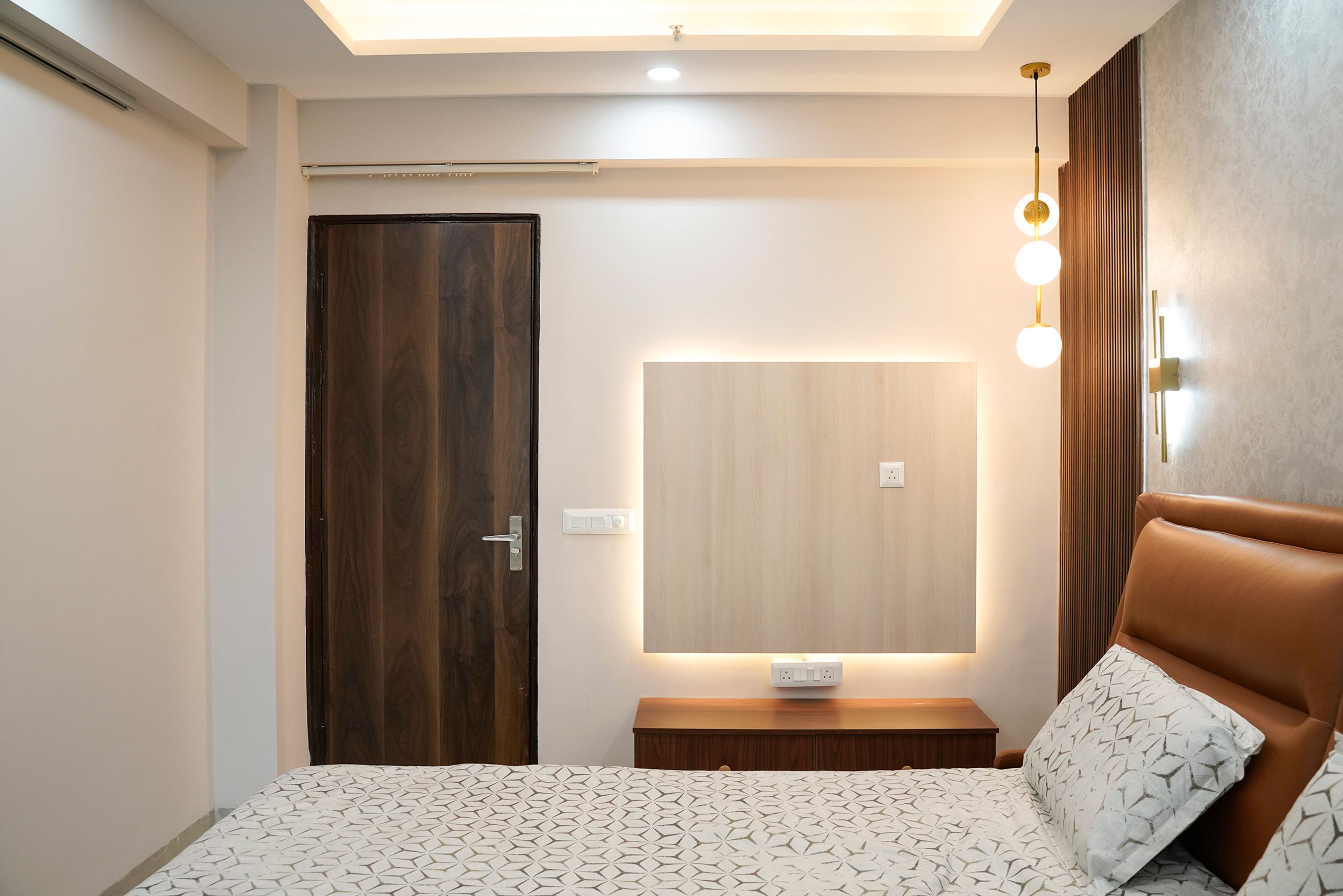 Bedroom Design with wooden TV unit