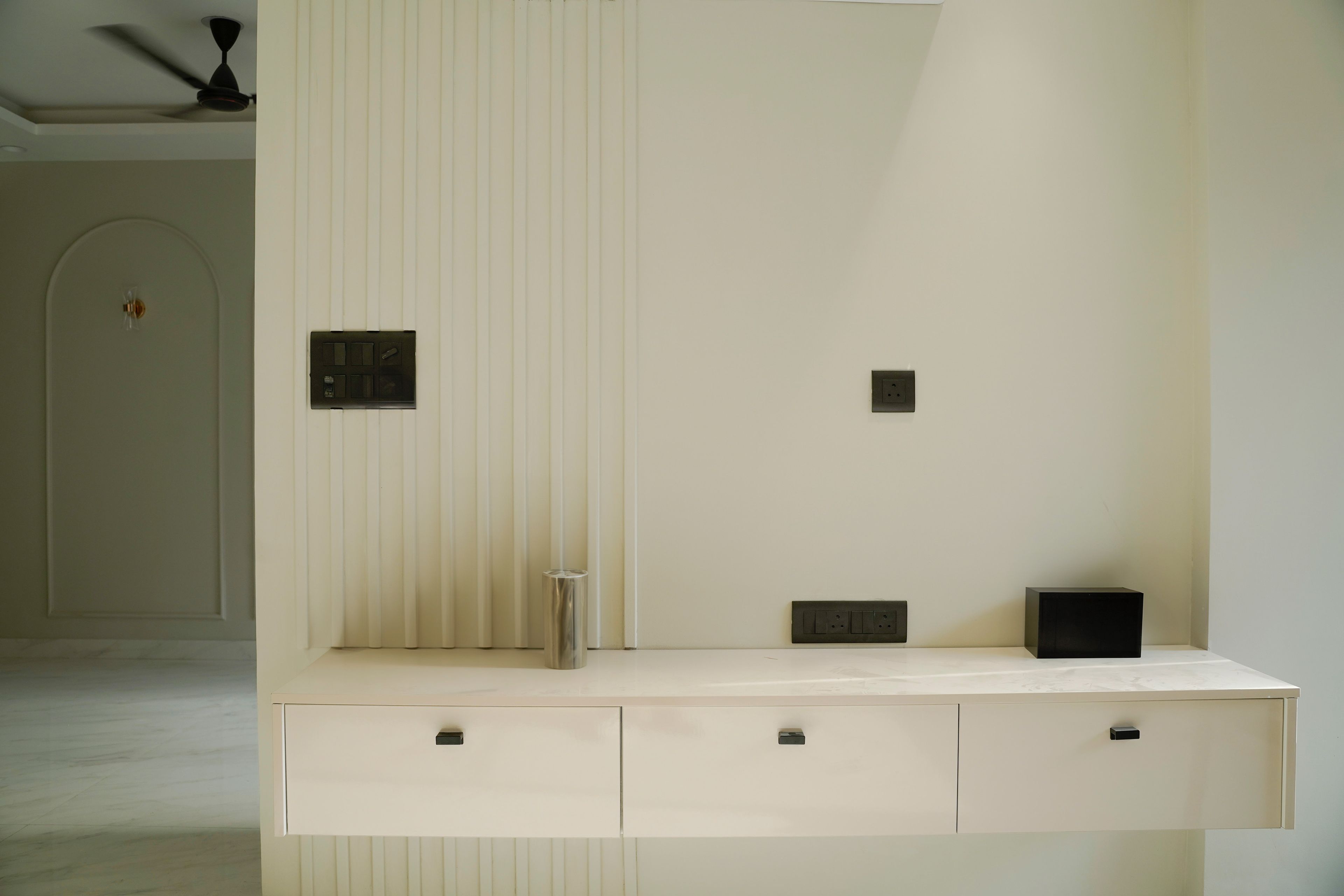 Cream TV Unit Design with Wall Slats Backsplash and Drawers