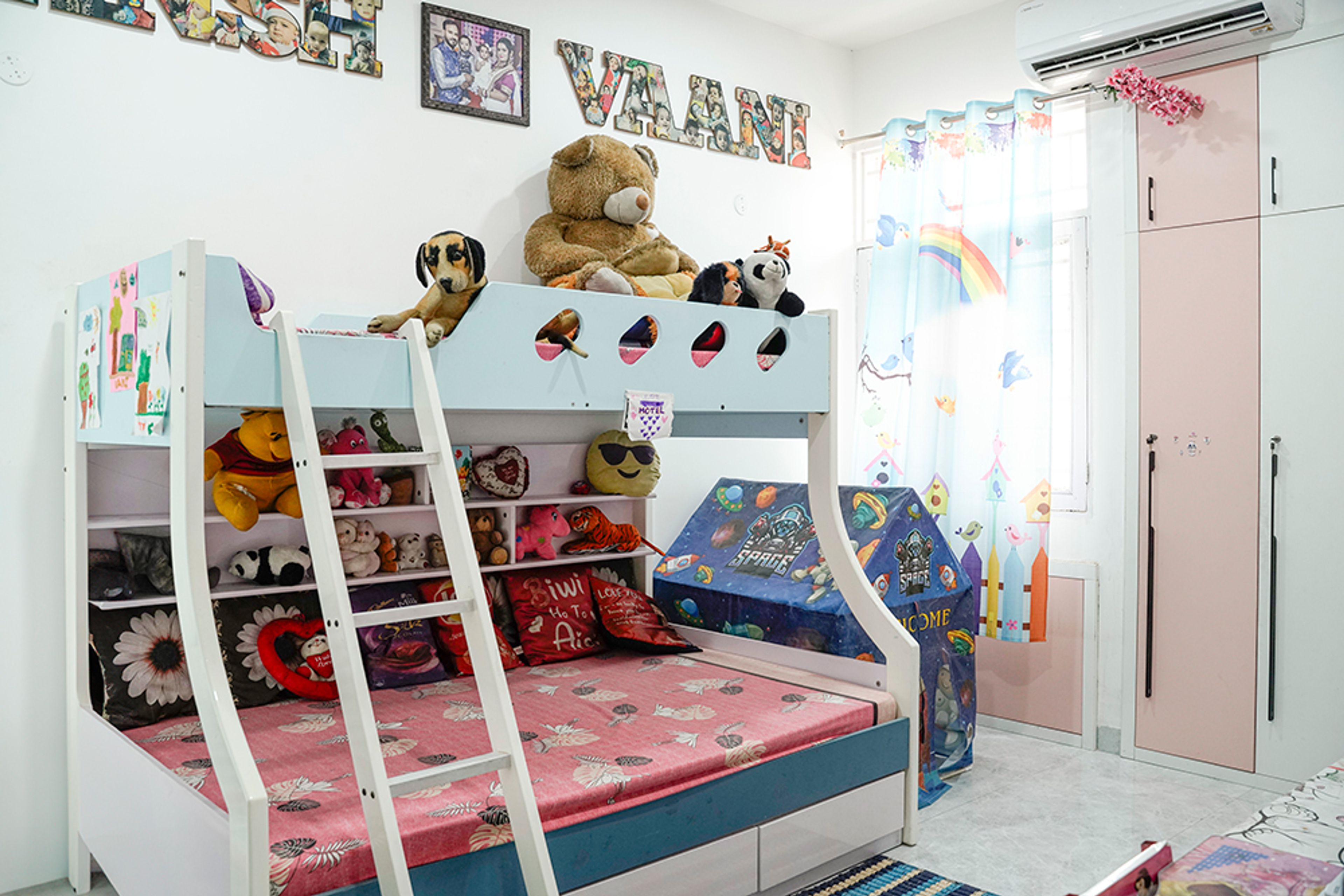 Kids Bedroom Design with Blue and White Bunk Bed and Cartoon-Themed Curtains