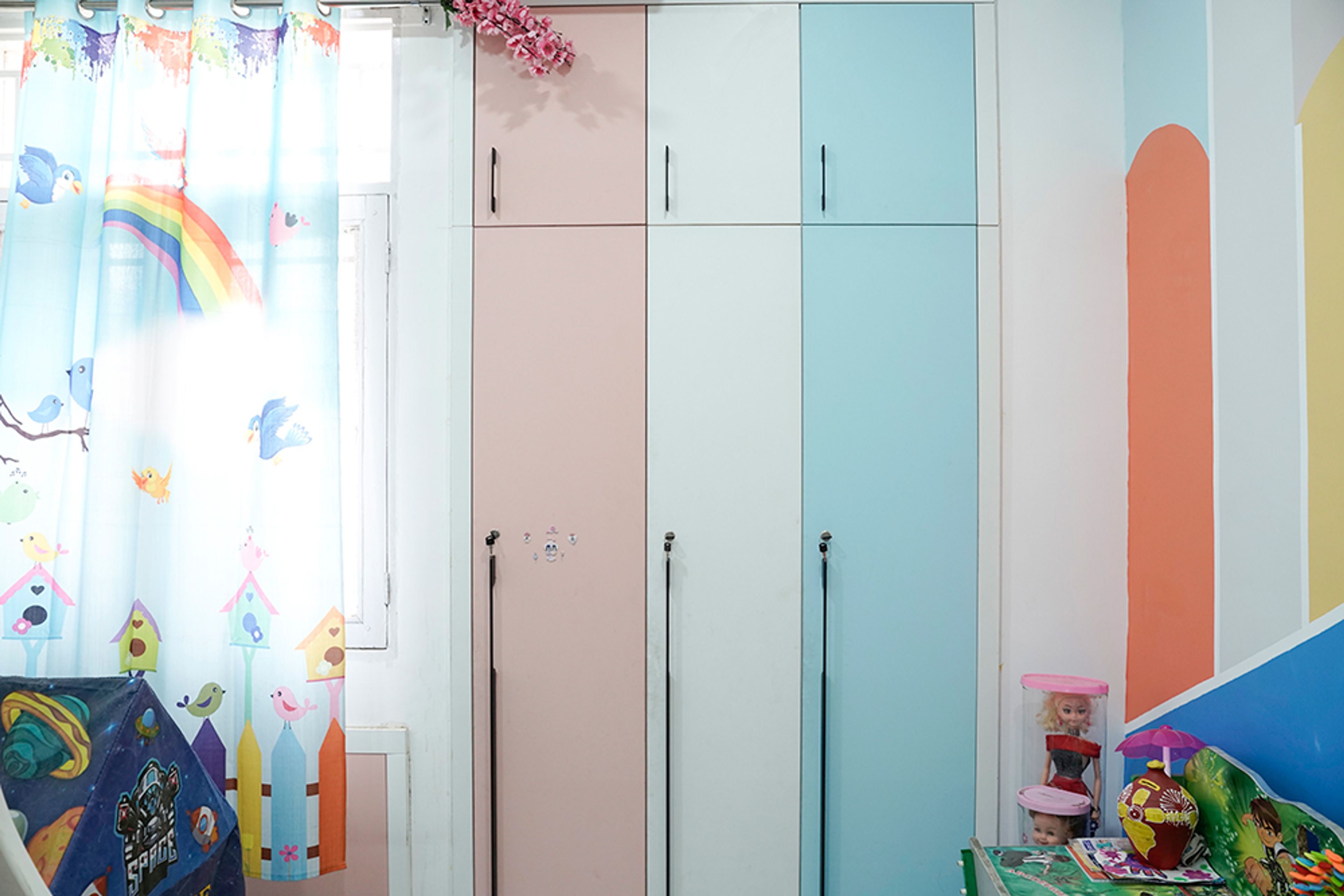 3-Door White, Blue and Peach Swing Wardrobe Design