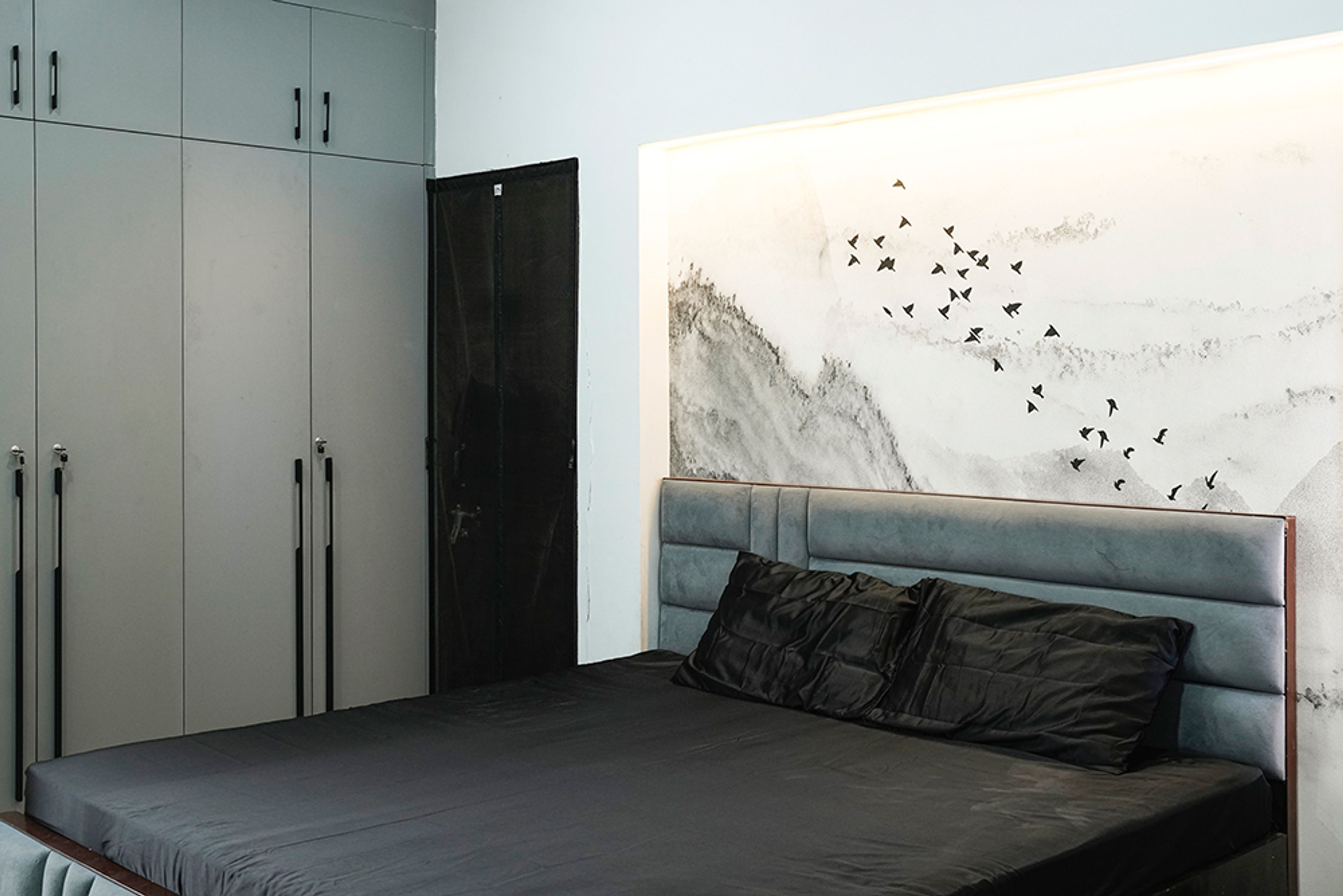 Master Bedroom Design with Grey Wardrobe and Bird Wall Mural