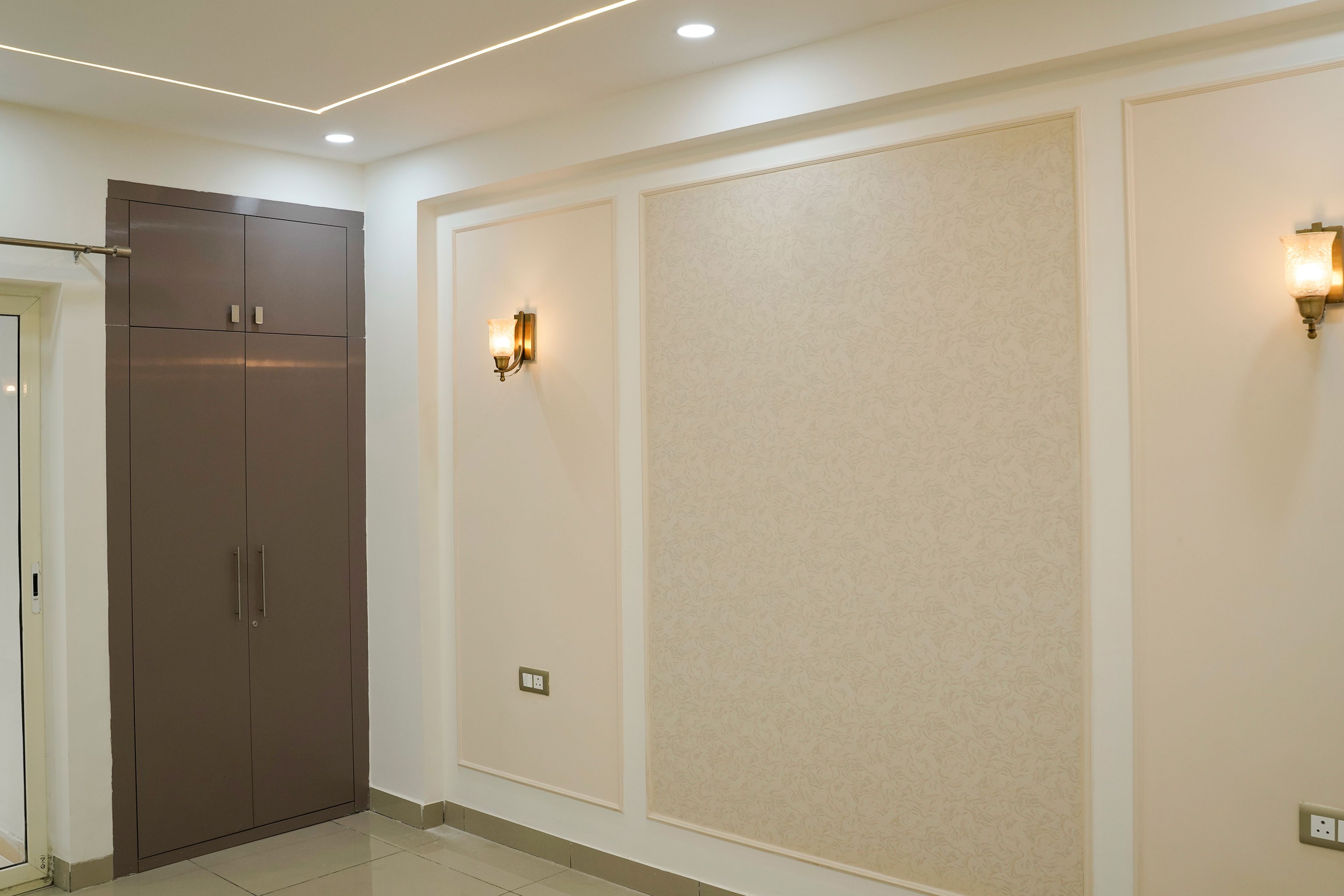 Bedroom Design with Textured Cream Walls and 2-Door Brown Swing Wardrobe
