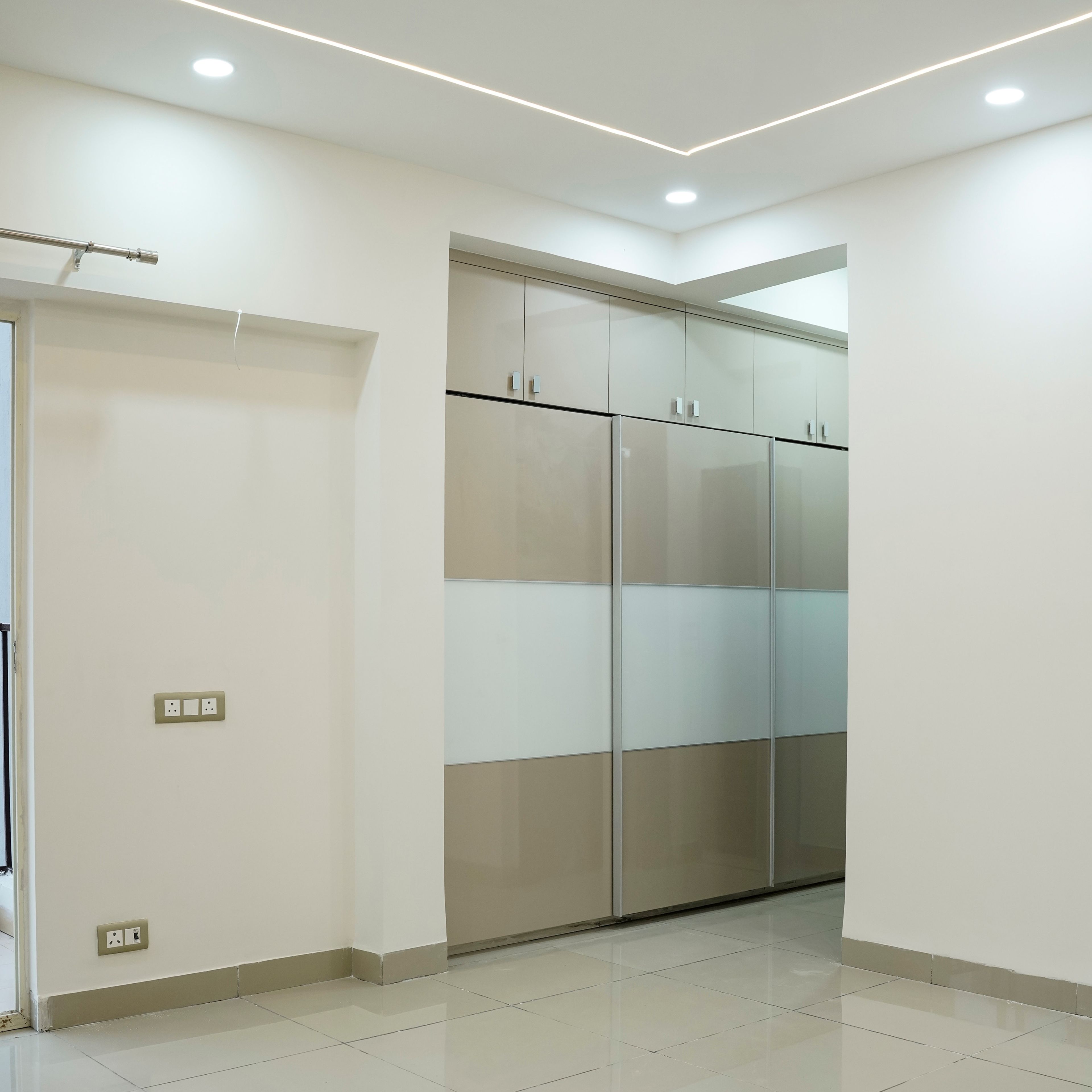 3-Door Beige and White Sliding Door Wardrobe Design