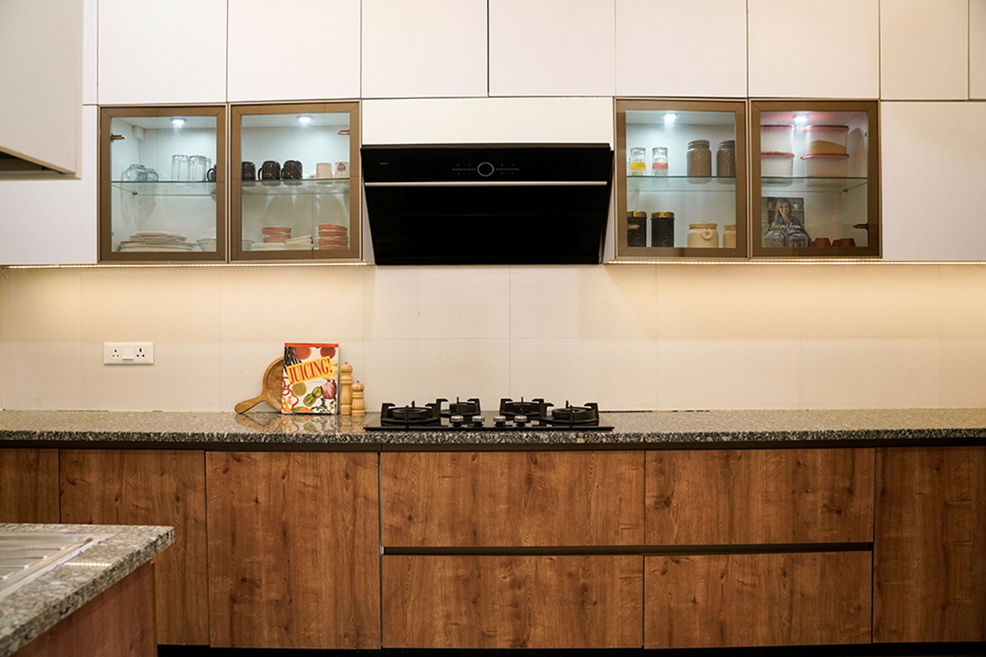 Modern Kitchen Design with Wooden Units in Noida 4BHK Apartment