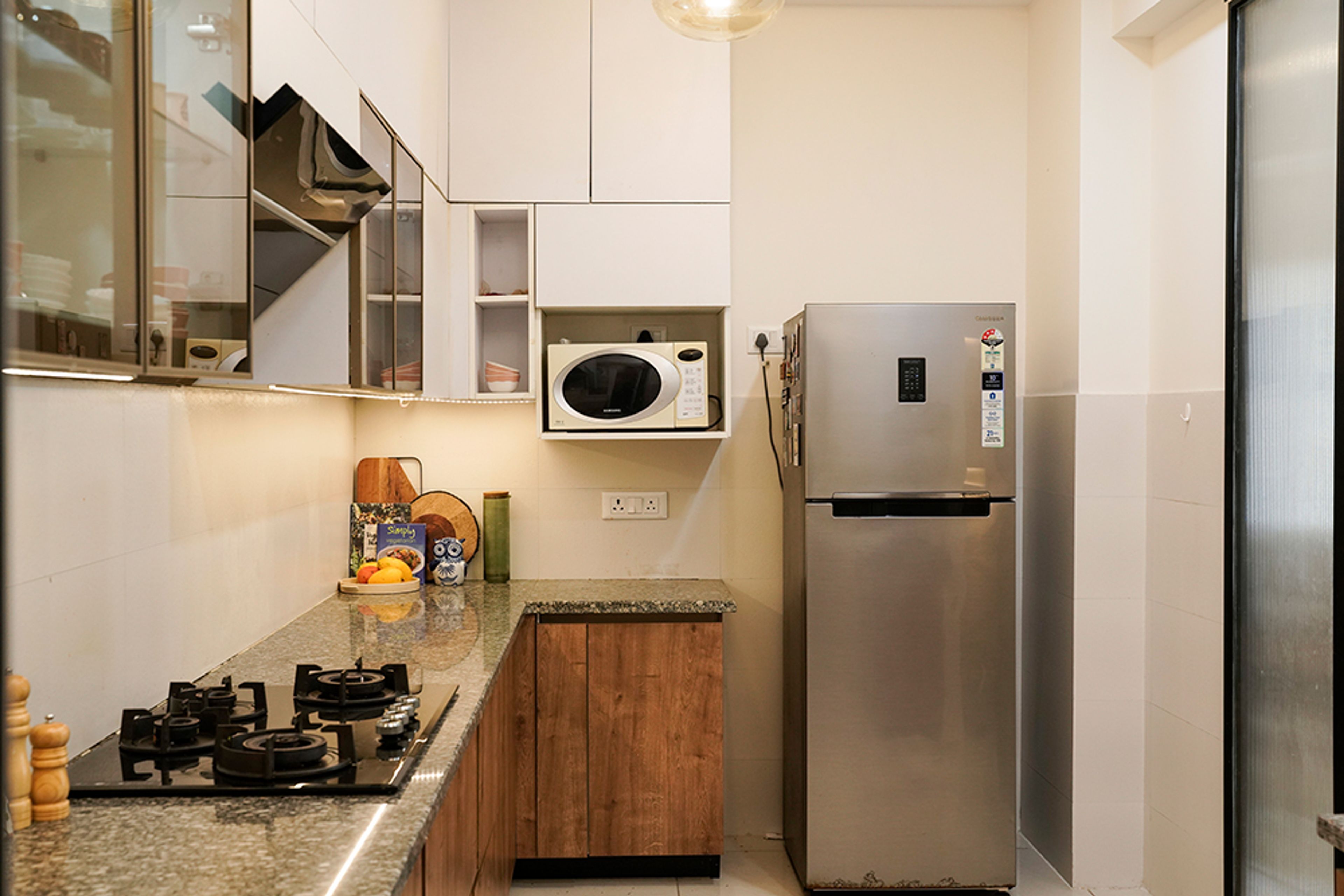 Modern Kitchen Design with Granite Countertop in Noida 4BHK Apartment