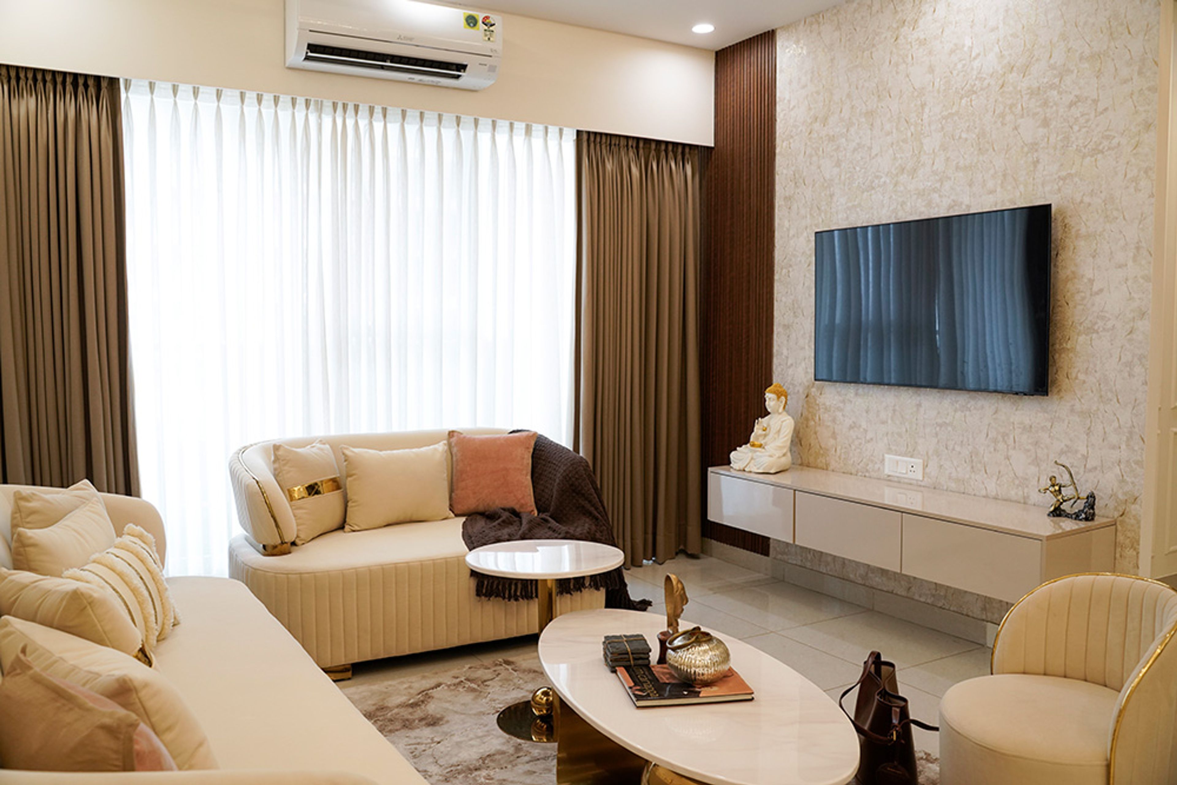 Modern Living Design with TV Unit in Noida 4BHK Apartment