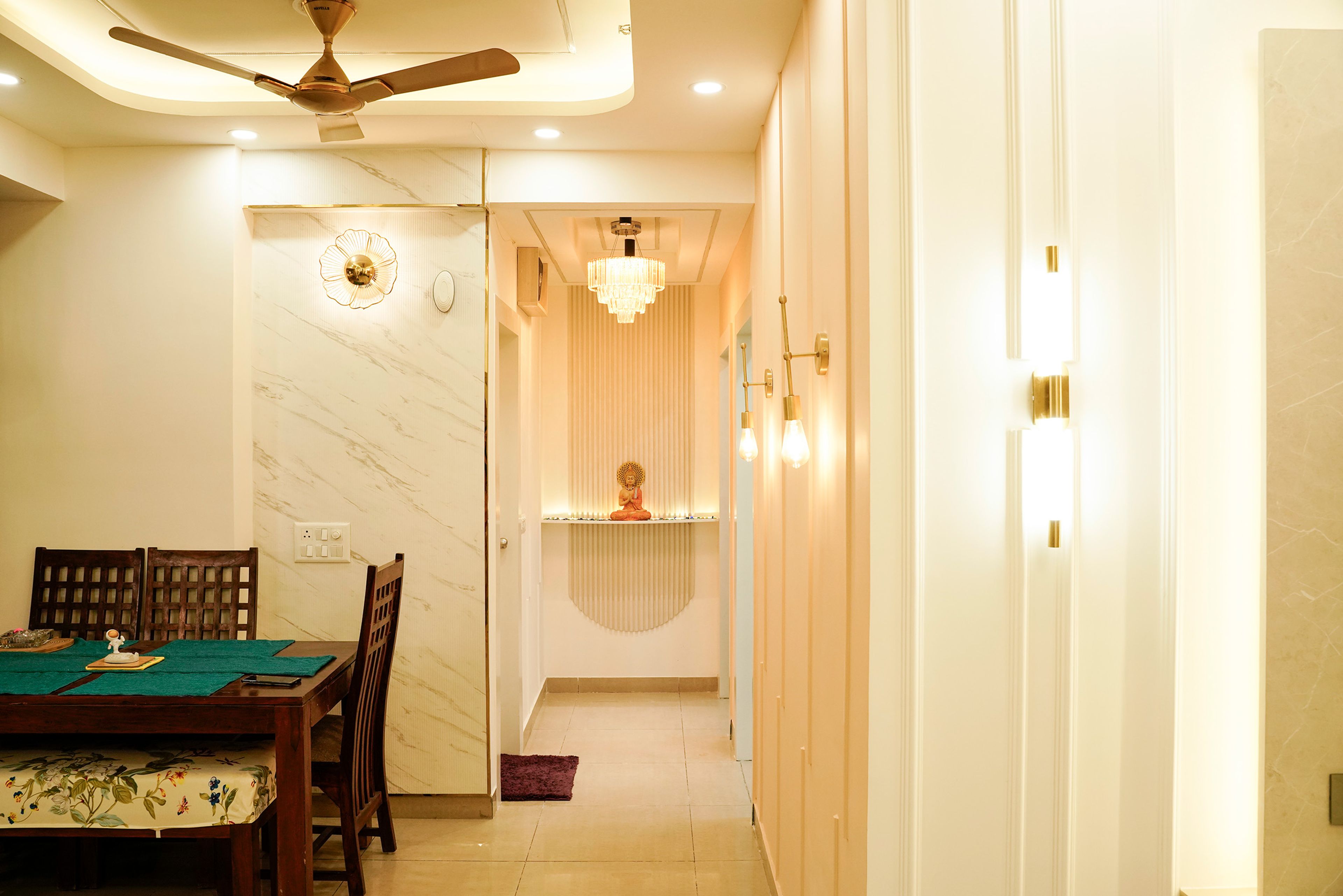 Foyer Design with Budhha Idol and Panel Wall