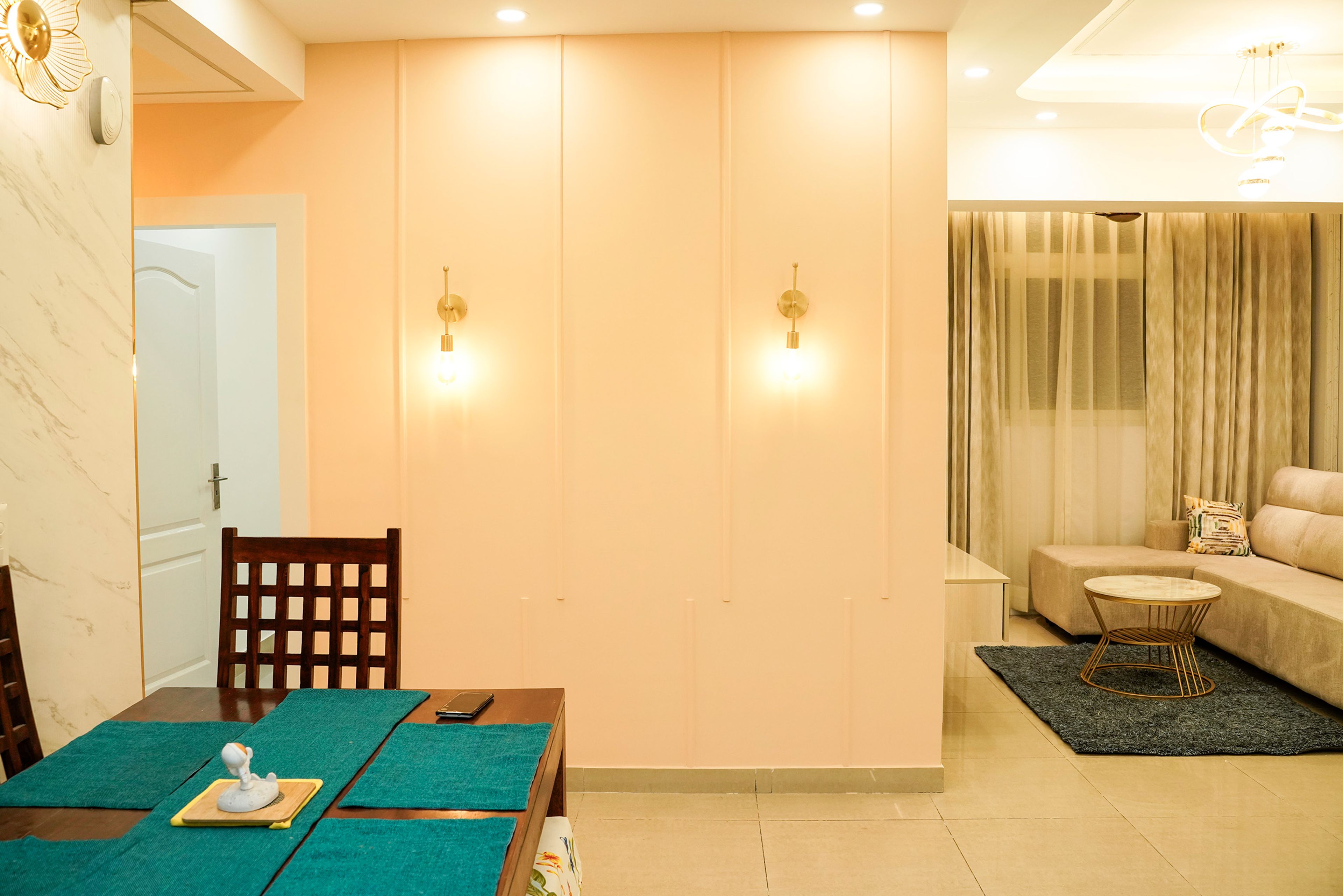 Pink Wall Design with Trims and Wall Lights