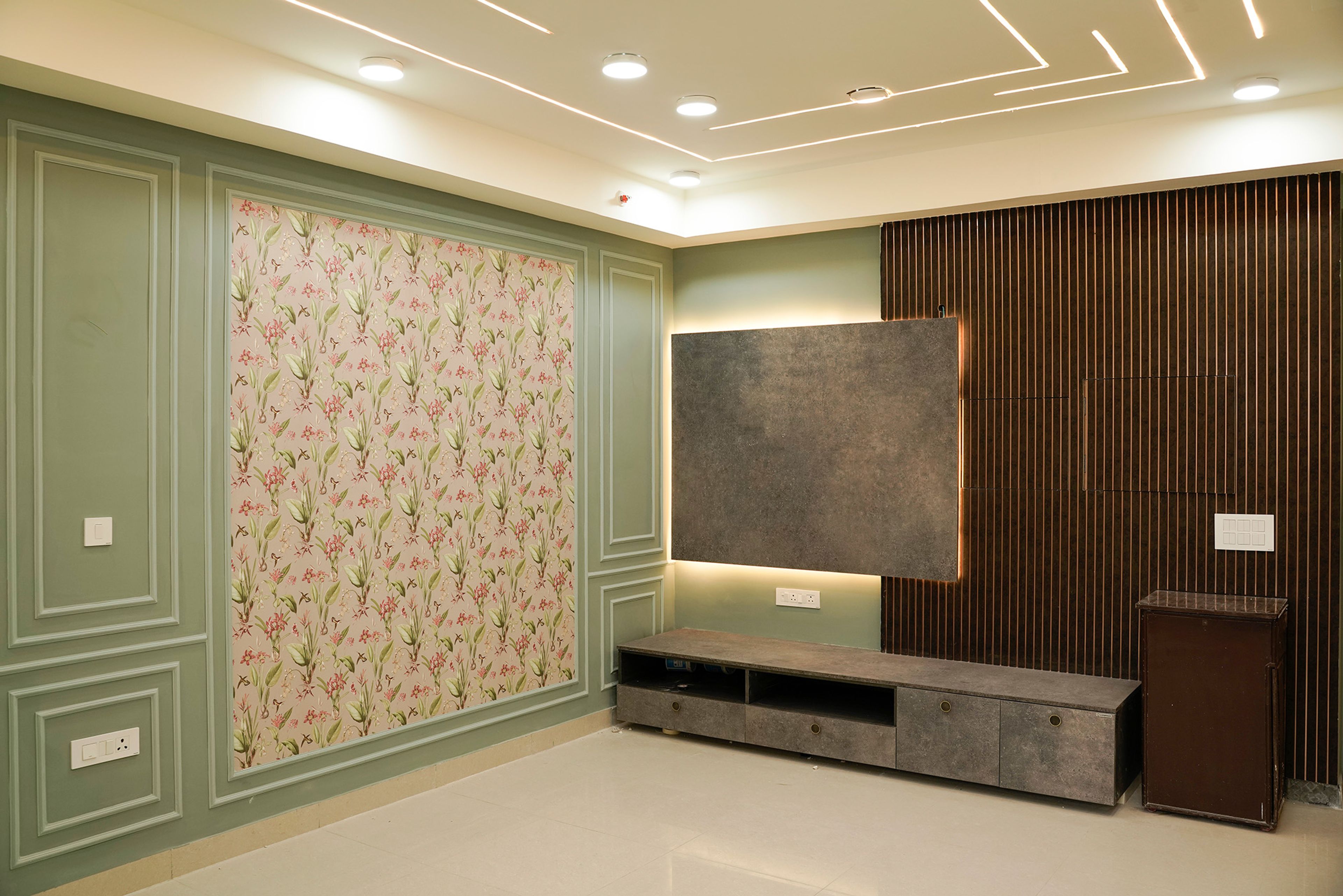 Living Room Design with Floral Wallpaper and Backlit Wooden TV Unit