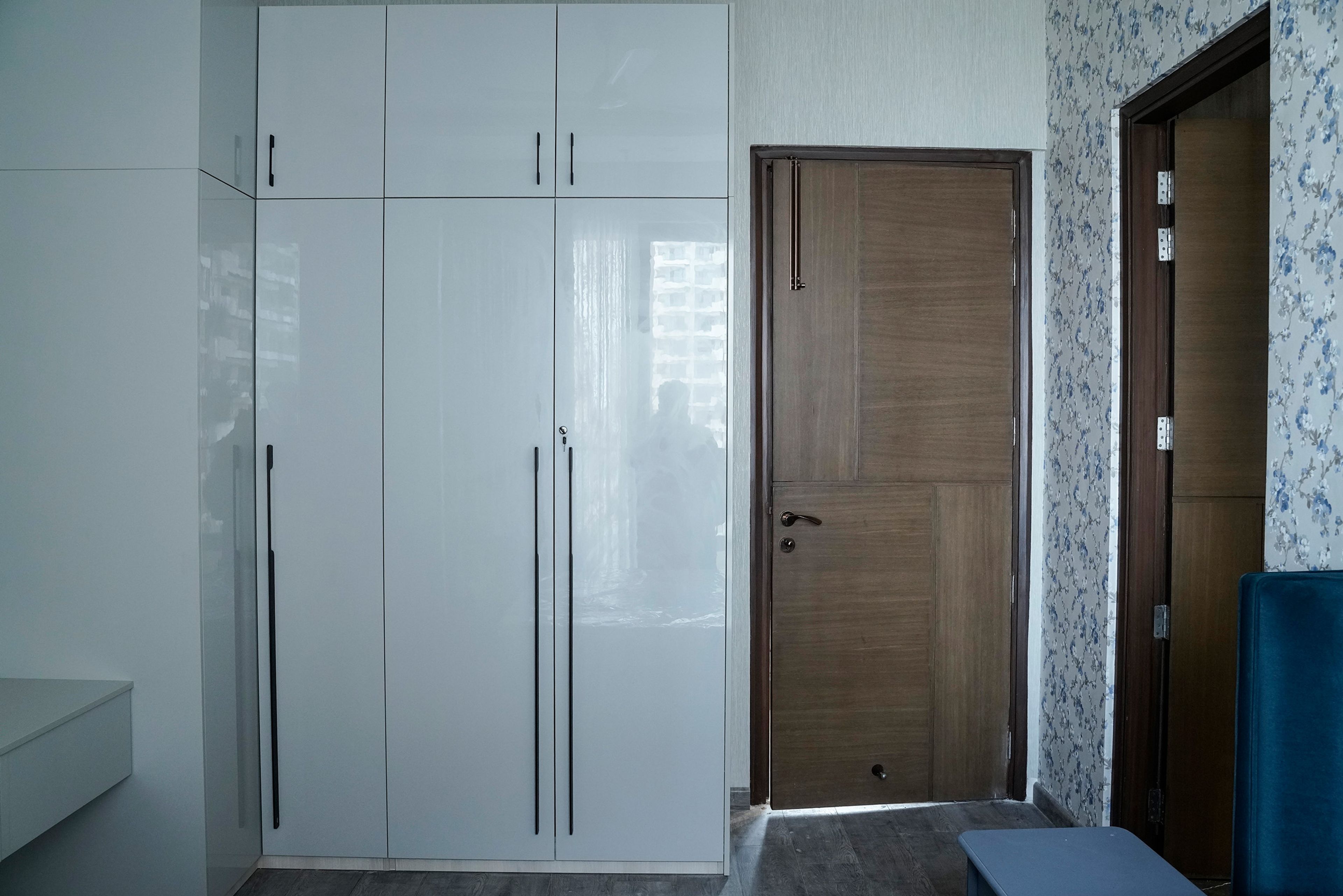 3-Door Grey Swing Wardrobe Design