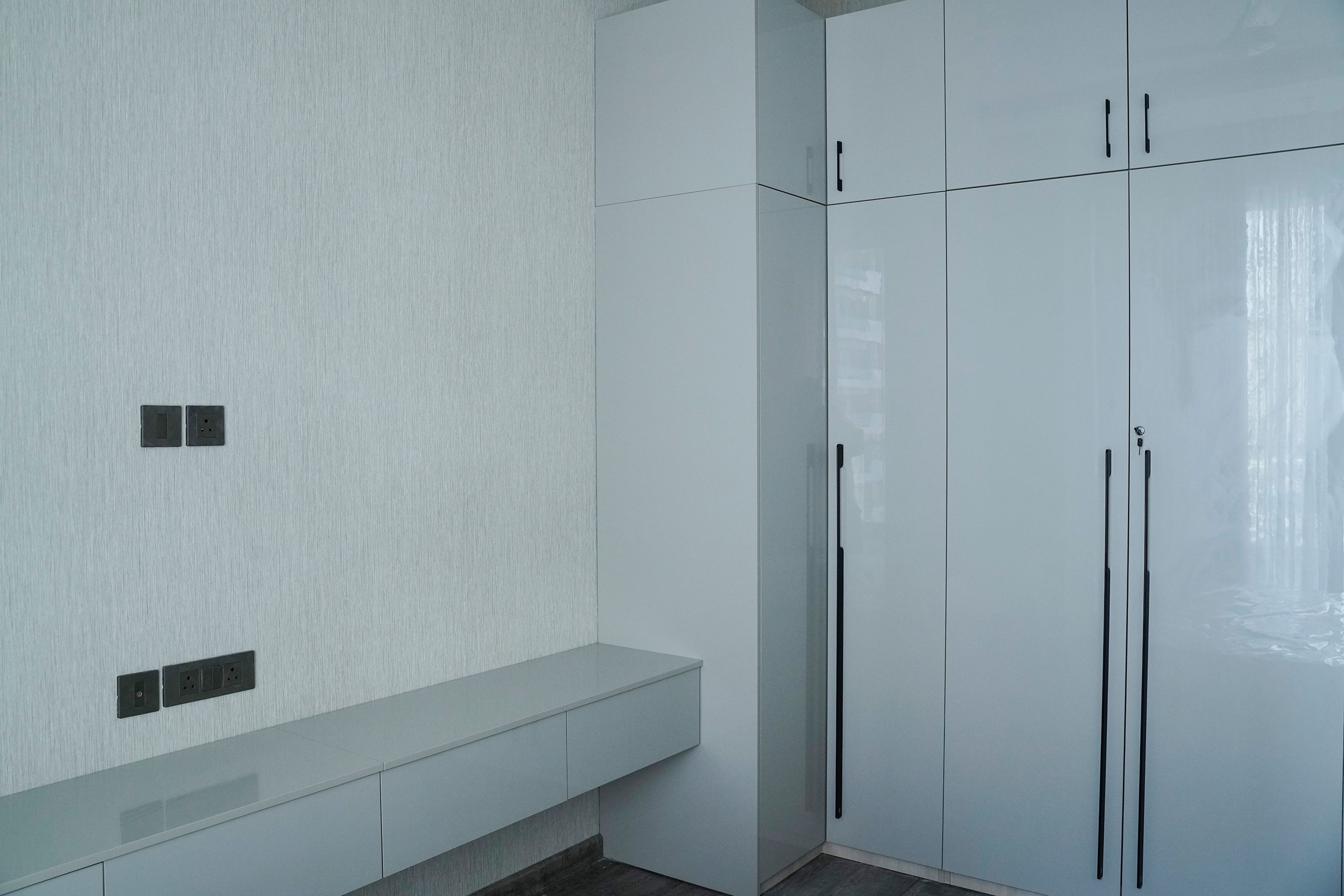 TV Unit and 3-Door Grey Swing Wardrobe Design
