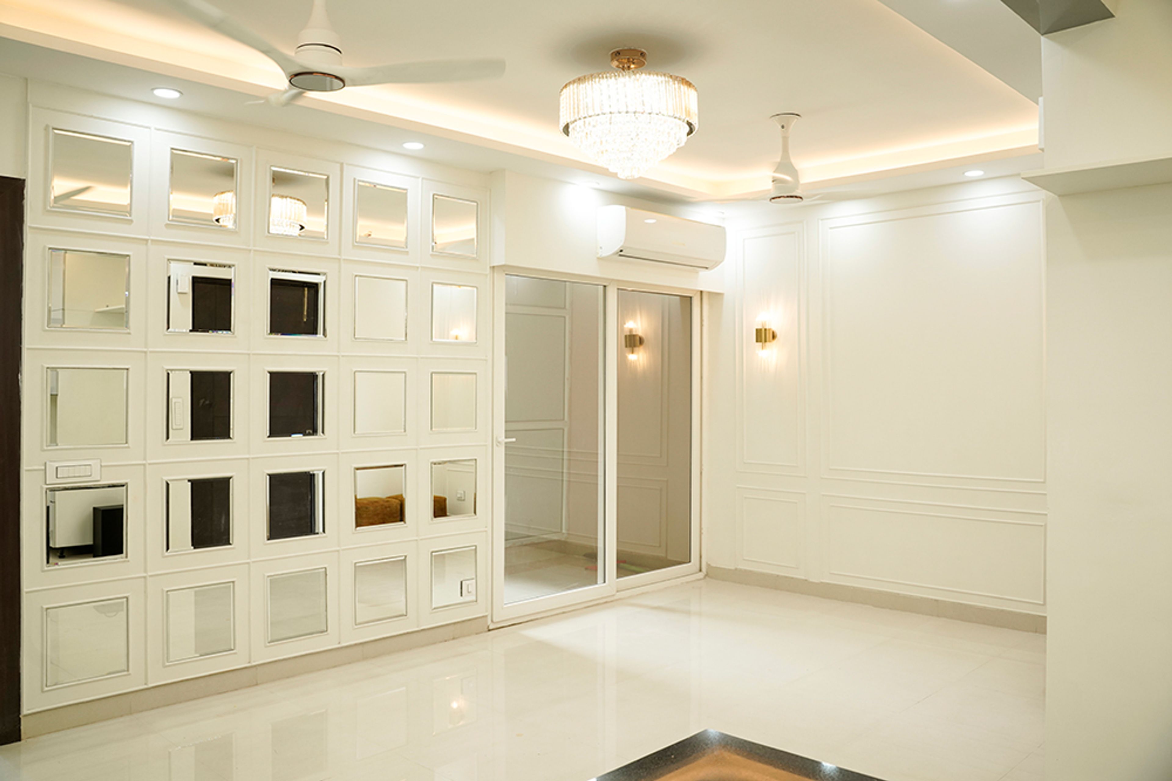 Living Room Design with Mirror Panel Wall, White Moulding and 2-Door Mirror Sliding Wardrobe