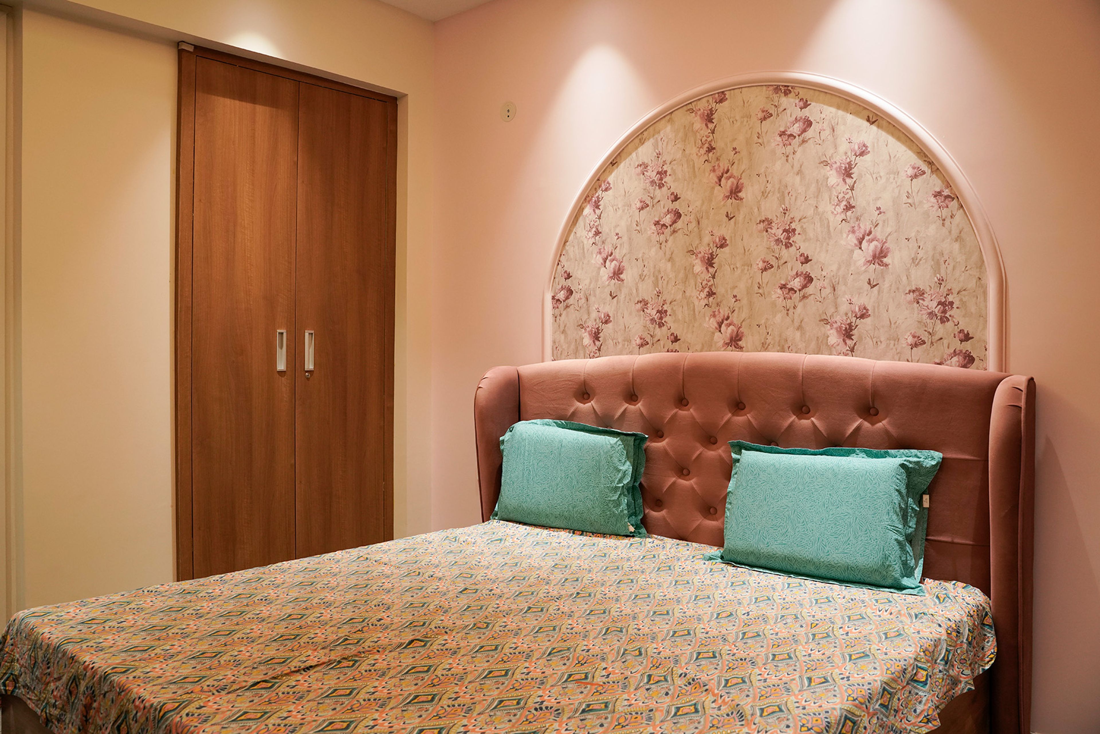 Bedroom Design with Pink Floral Arched Wall