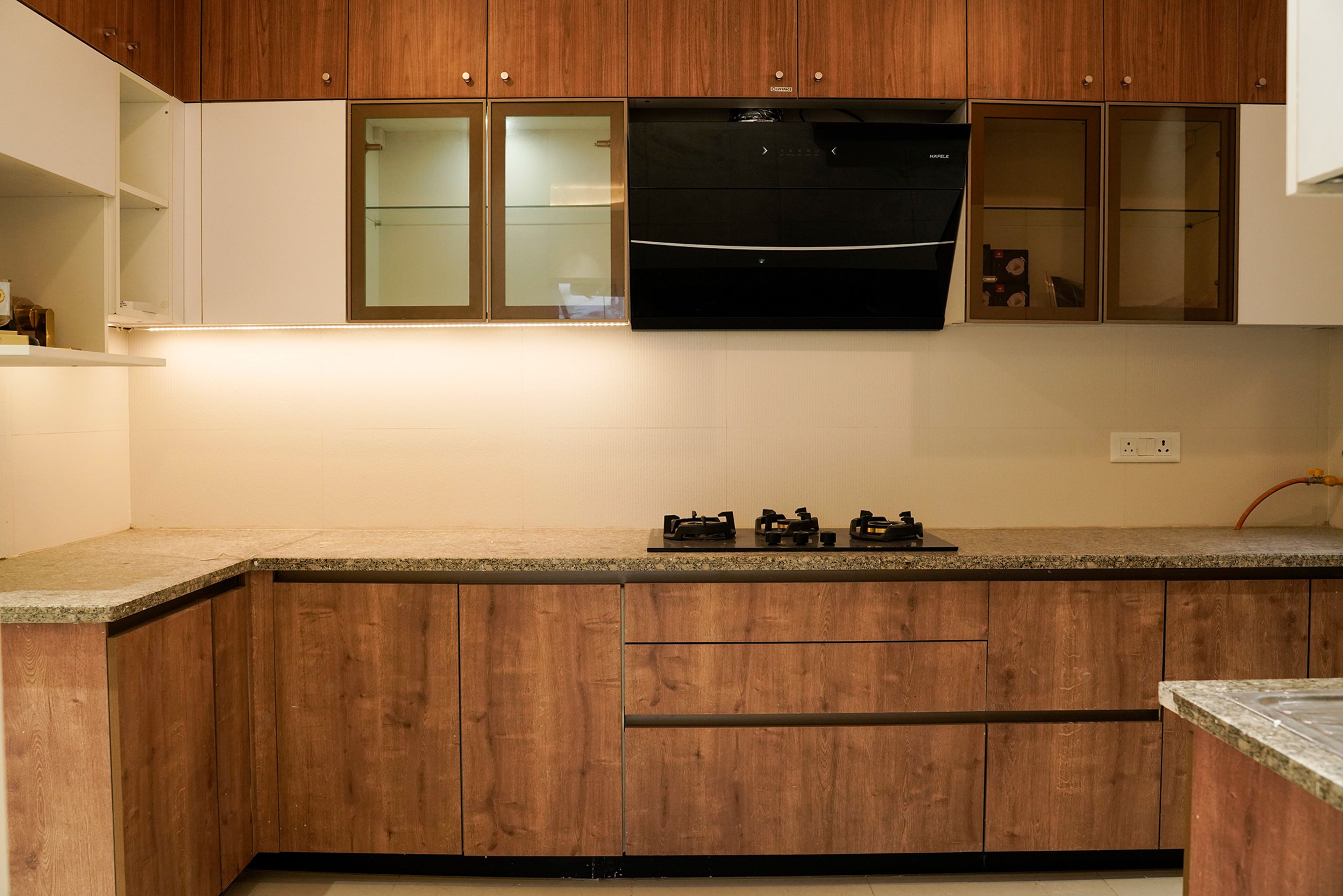 L-Shaped Kitchen Design with Wooden Cabinets