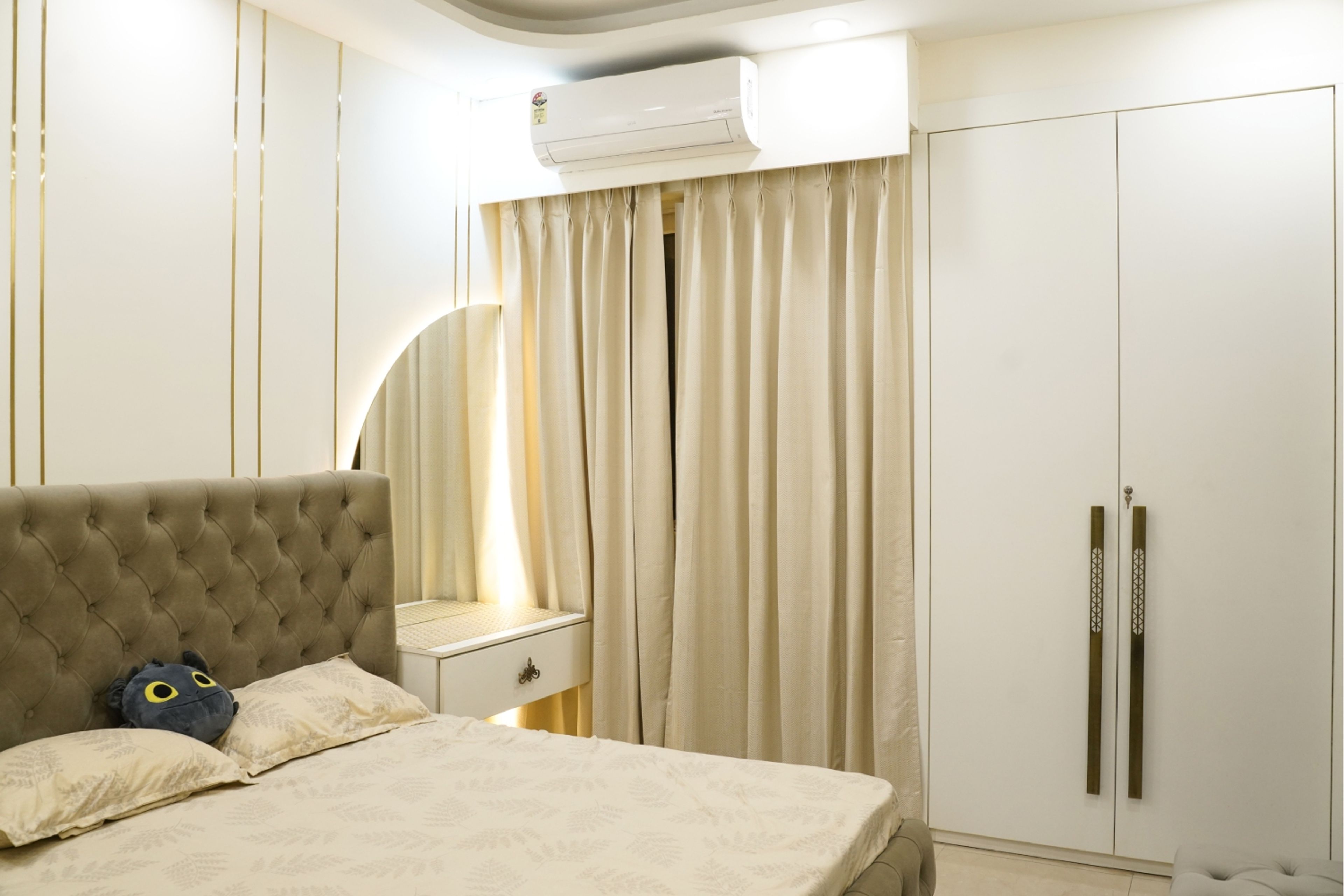 2-Door Wardrobe Design with White Swing Doors and Beige Upholstered Headboard