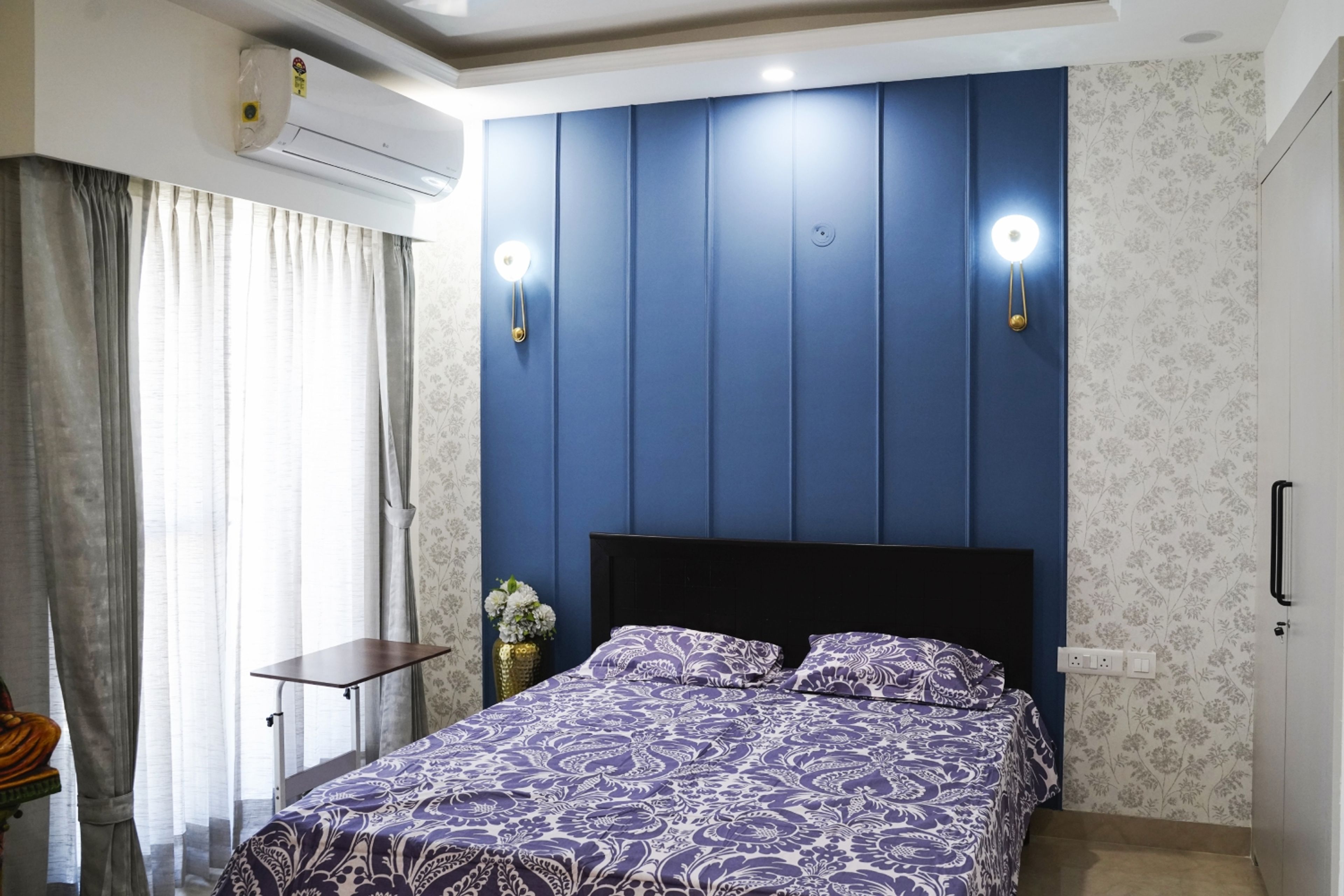 Master Bedroom Design with Blue Wall Panels and Floral Wallpaper