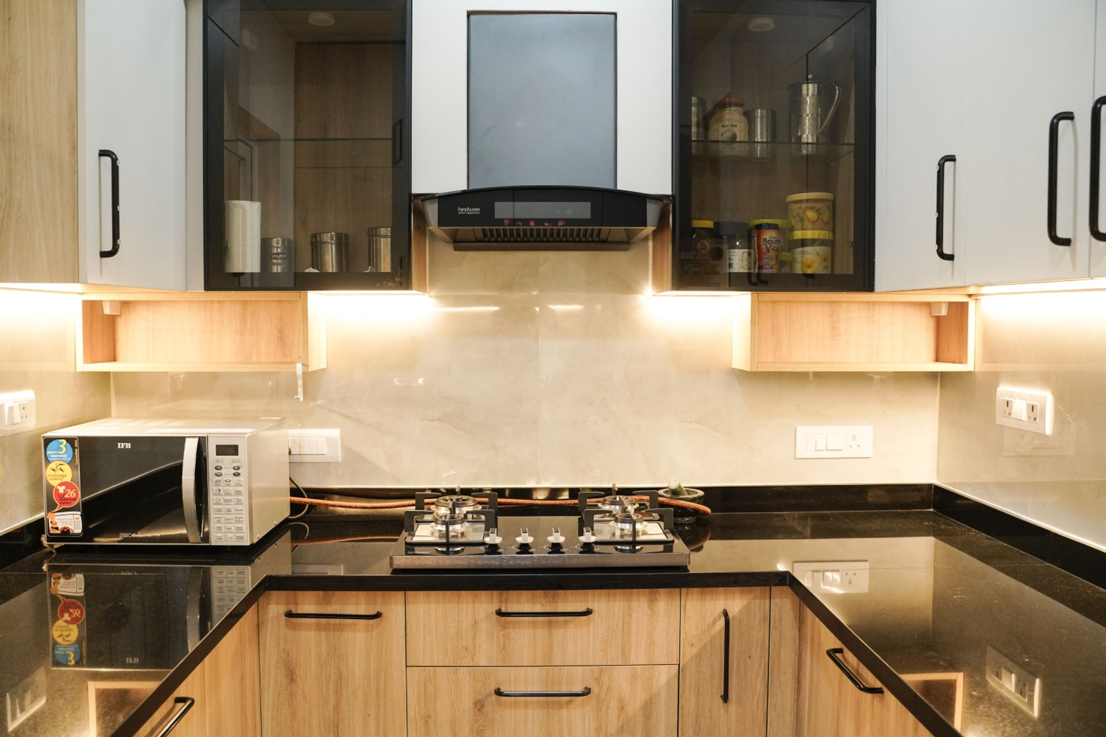 U-Shaped Kitchen Design with Under Cabinet Lighting