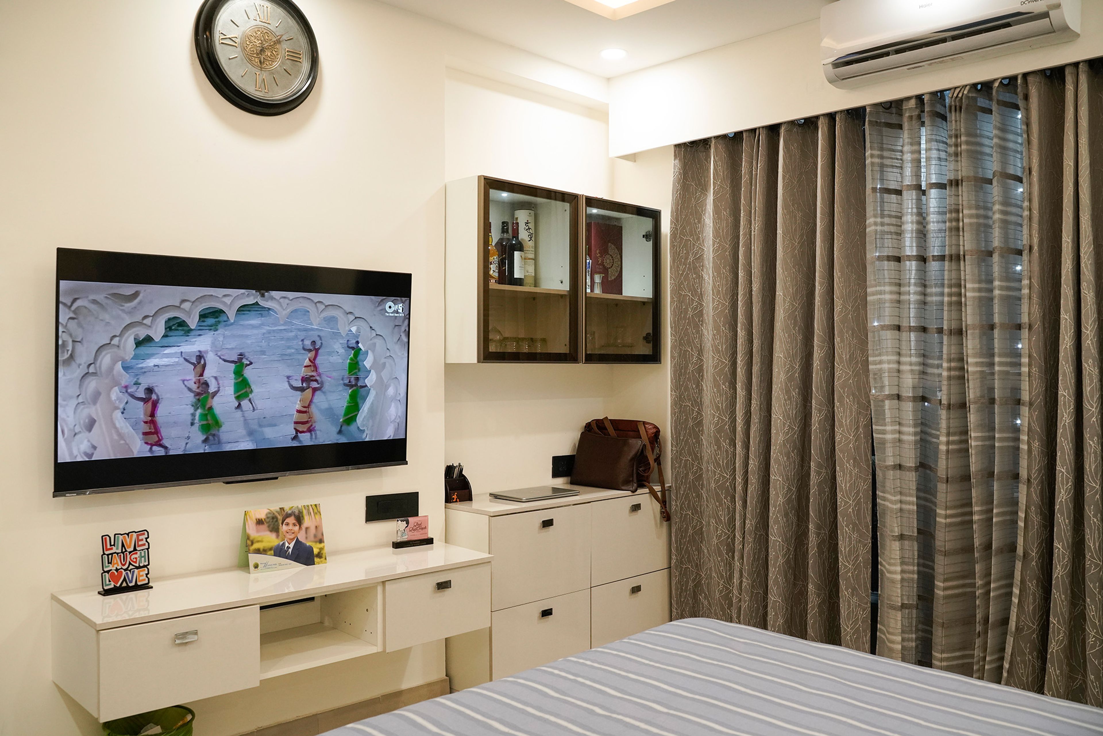 Bedroom Design with Off-White TV Unit and Storage Unit