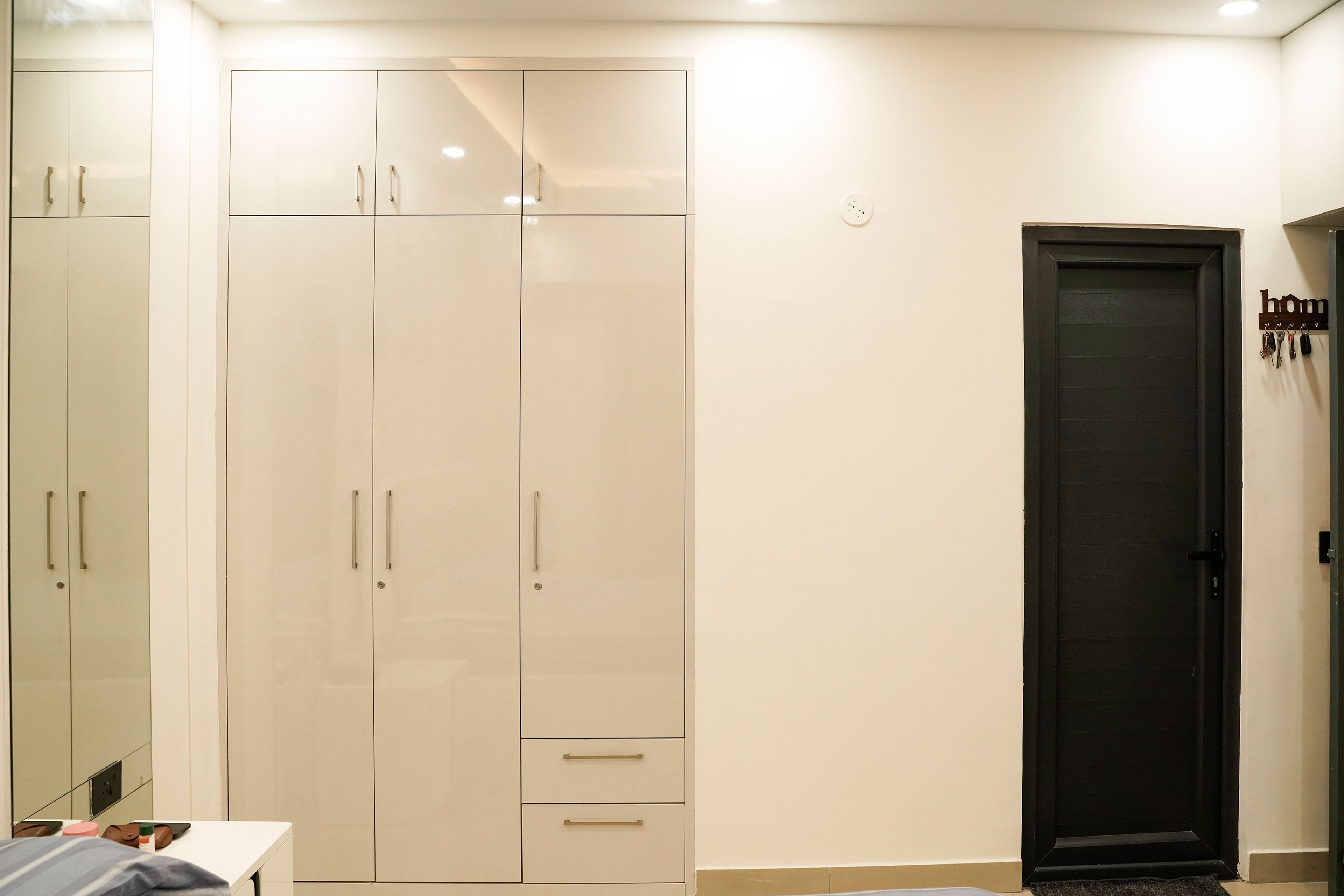 3-Door Cream Swing Wardrobe Design